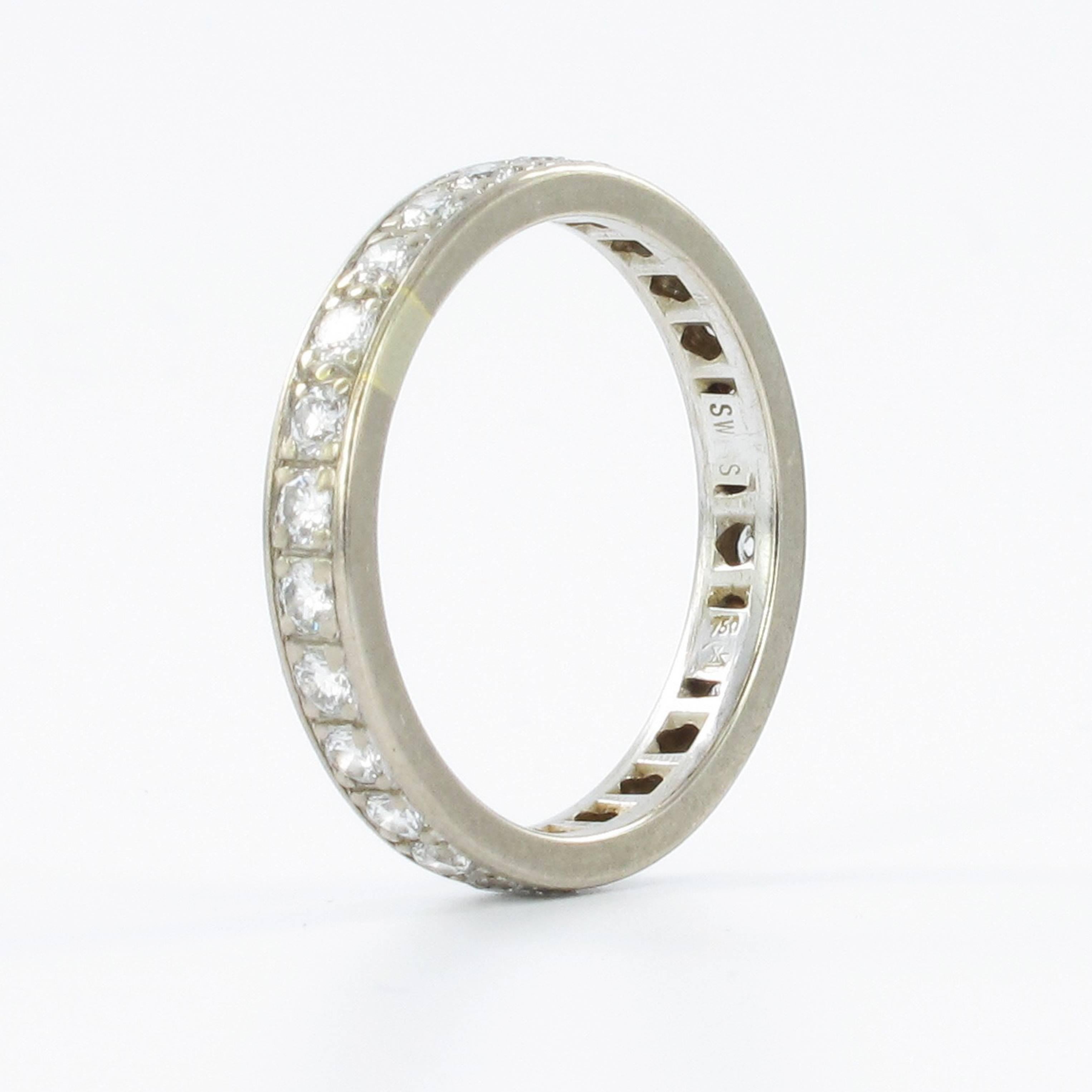 Diamond eternity band in 18 karat white gold. Featuring 26 round brilliant cut diamonds with G-H colour and vs clarity. Total weight approximately 1.05 carats. 

Size 58.5

Maker's mark: Gübelin

Stock Number: 1000181286