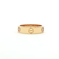 Cartier “Love” Ring in 18k Yellow Gold with Diamonds