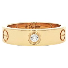 Cartier “Love” Ring in 18k Yellow Gold with Diamonds