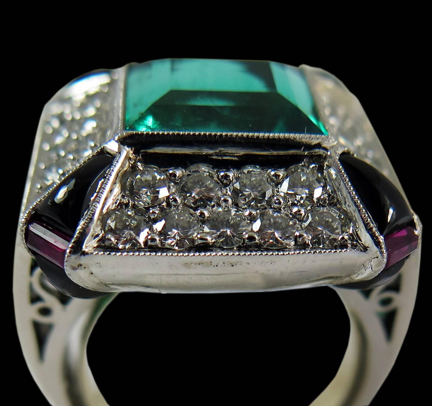 Stunning Colombian Emerald Ruby Diamond Onyx Platinum Ring In Good Condition For Sale In Austin, TX