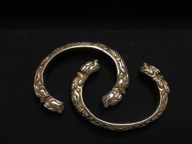 Pair of Bhutanese ParcelGilt Silver Bangles, Mid20th Century at