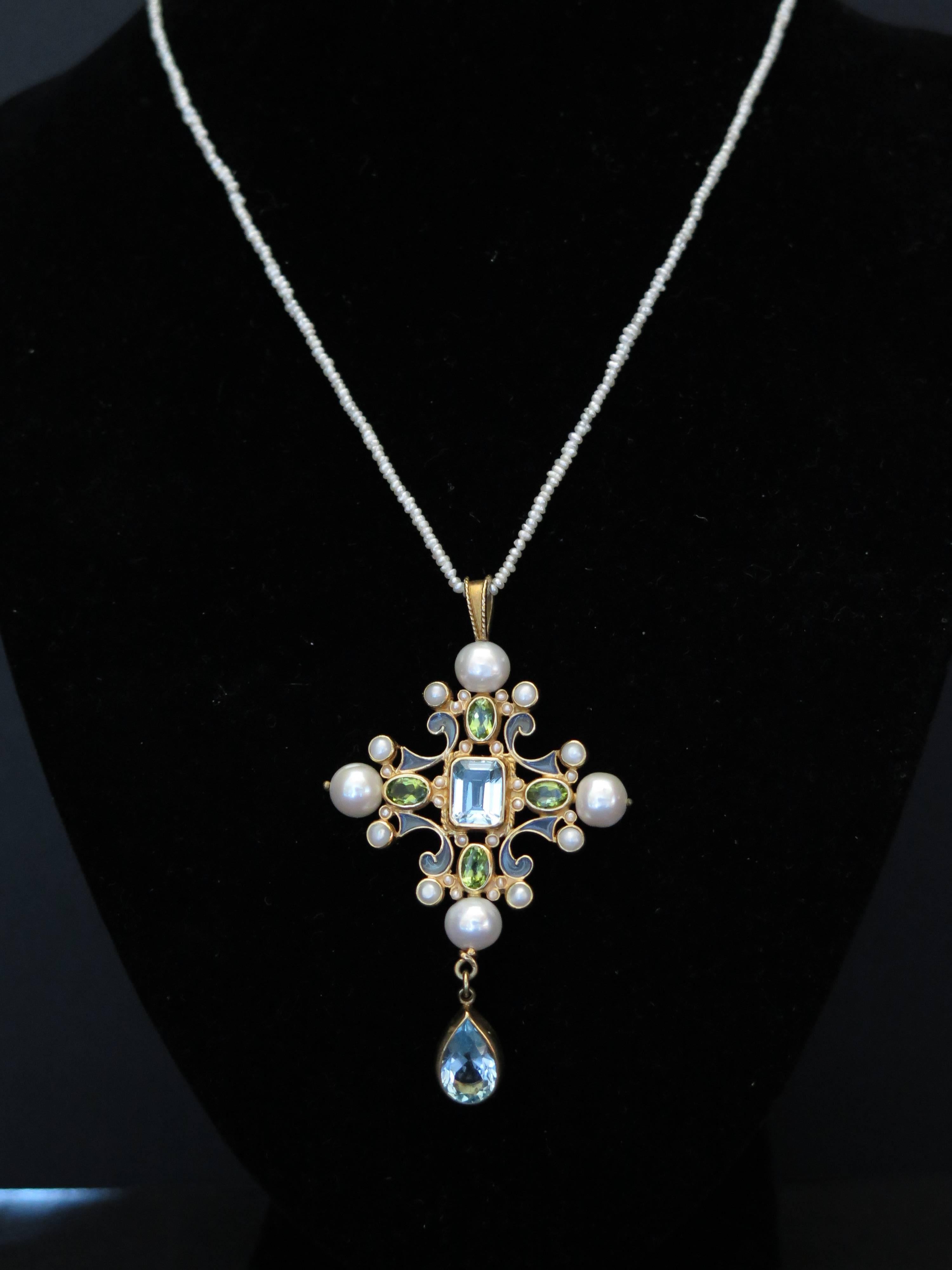 A beautiful aquamarine, peridot and pearl pendant on seed pearls chain  necklace by Percossi Papi. Gold on silver. Marked.