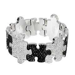 Akillis Puzzle Bracelet 18 Karat White Gold White and Black Diamonds
