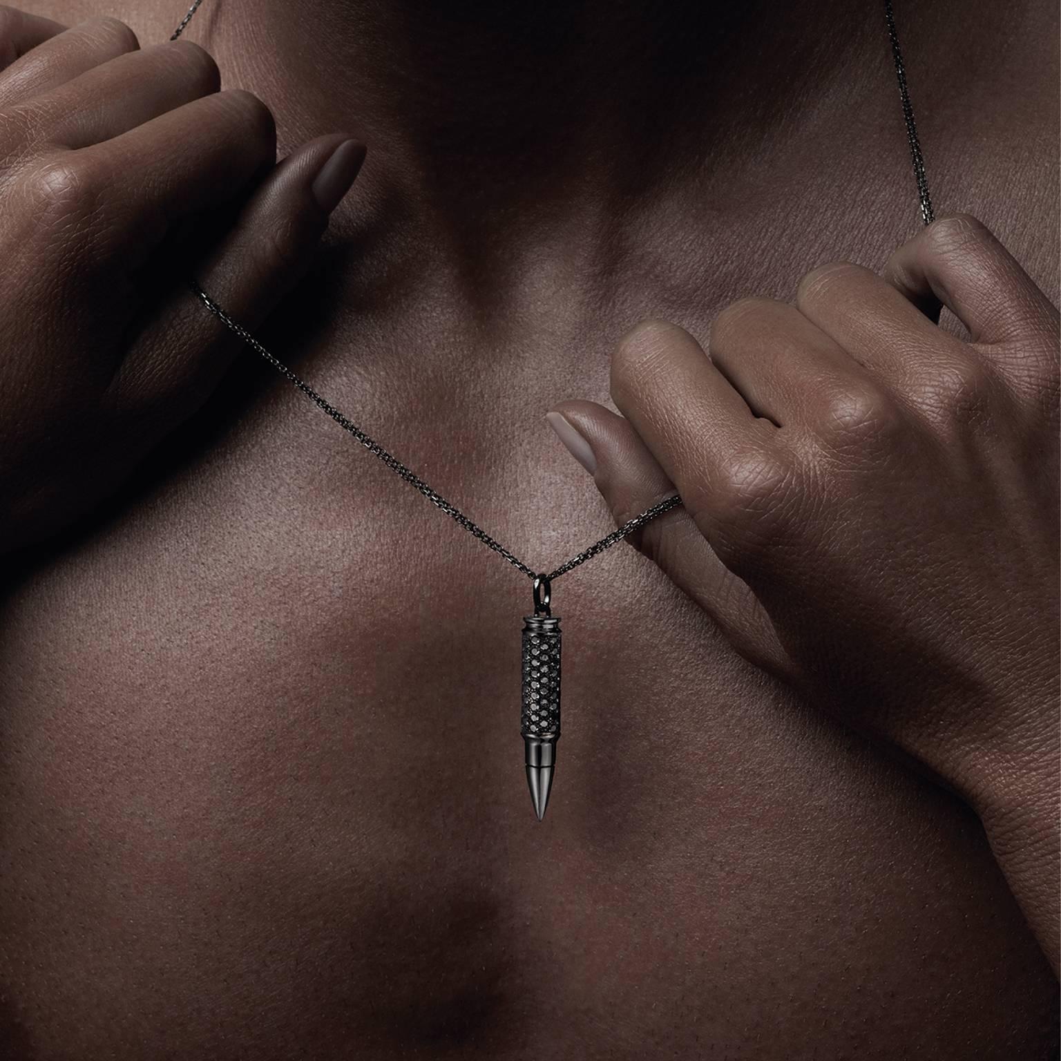 Titanium AKILLIS Fatal Attraction pendant 
The indicated price includes the Simple Belcher Silver chain of 60-65 cm.

The powerfully symbolic pendants of the Fatal Attraction Collection always hit their mark! Cast in white, pink or yellow gold at