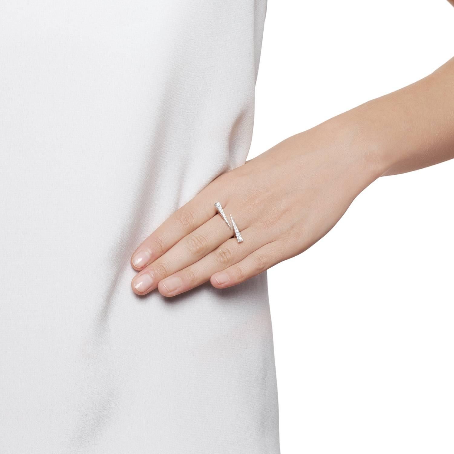 Twin Sparks Ring in 18 carat White Gold and Diamonds is a delicate modern, elegant and refined design. The signature Daou Sparks from the collection of delicate stacking rings and convertible earrings takes the perfectly proportioned 7 stone set