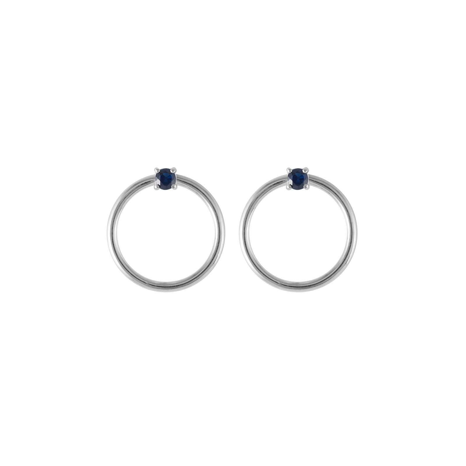 Sapphire and white gold small front facing hoop earrings and the Large Orbit Hoop Multiplier earring jackets are here sold as a set and offered at a discount. Elegant chic earrings set with round brilliant cut blue sapphires in 18 karat white gold.