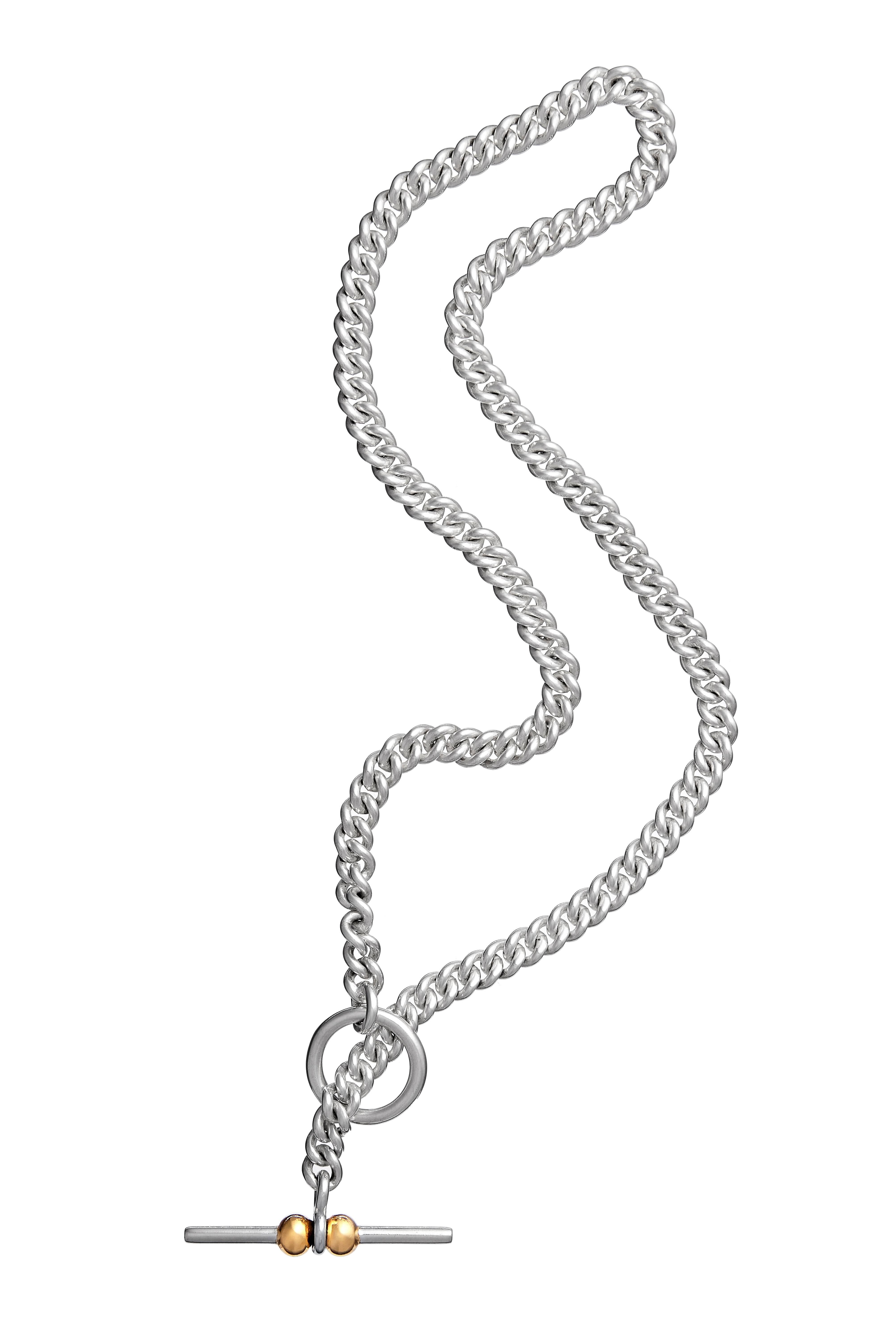 Inspired by antique fob chains found on pocket watches this is a clean contemporary twist. The necklace is made from 6mm silver curb chain, the piece has a substantial weight whilst still being elegant and simply. Fastened at the with a classic