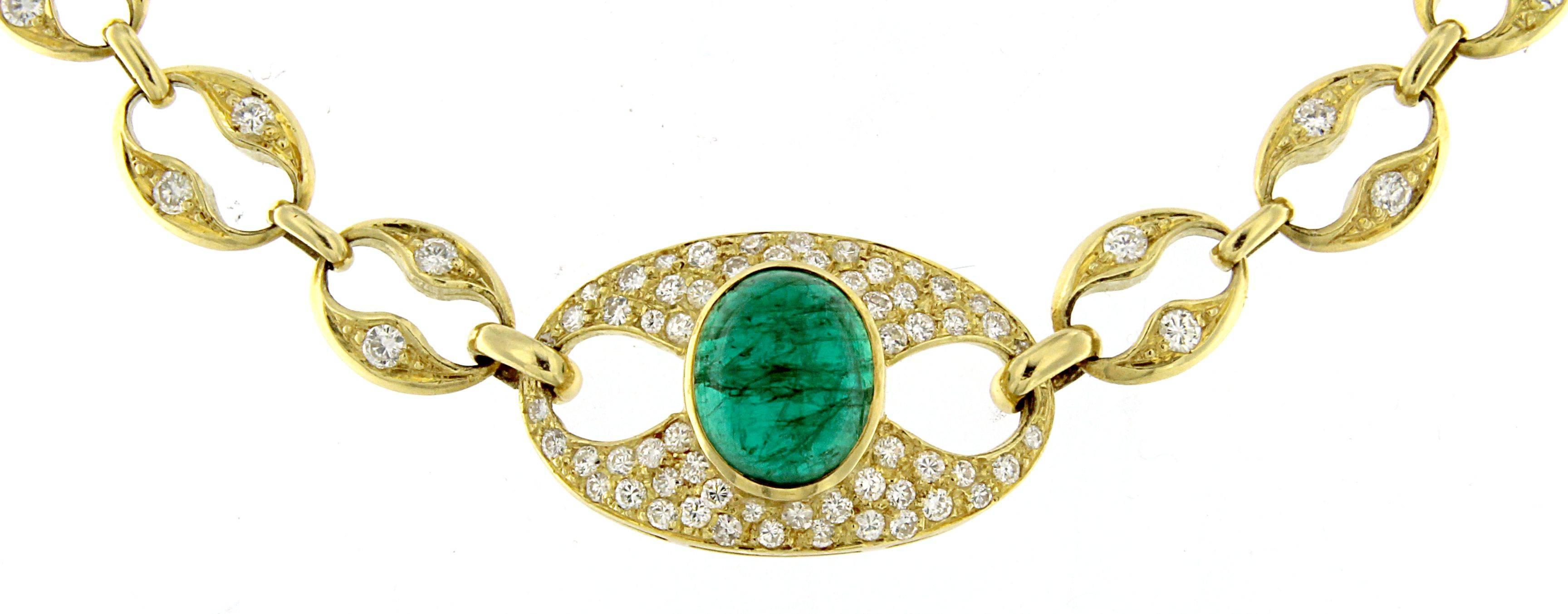 Elegant round necklace with a splendid oval cut emerald as a central element which exalts the rhythm and the balance also reproduced in the chain. It is entirely hand made and very refined; its original degrading to the closure and the retractable