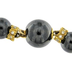 Hematite Beads Necklace in 18 Karat Gold and White Diamonds