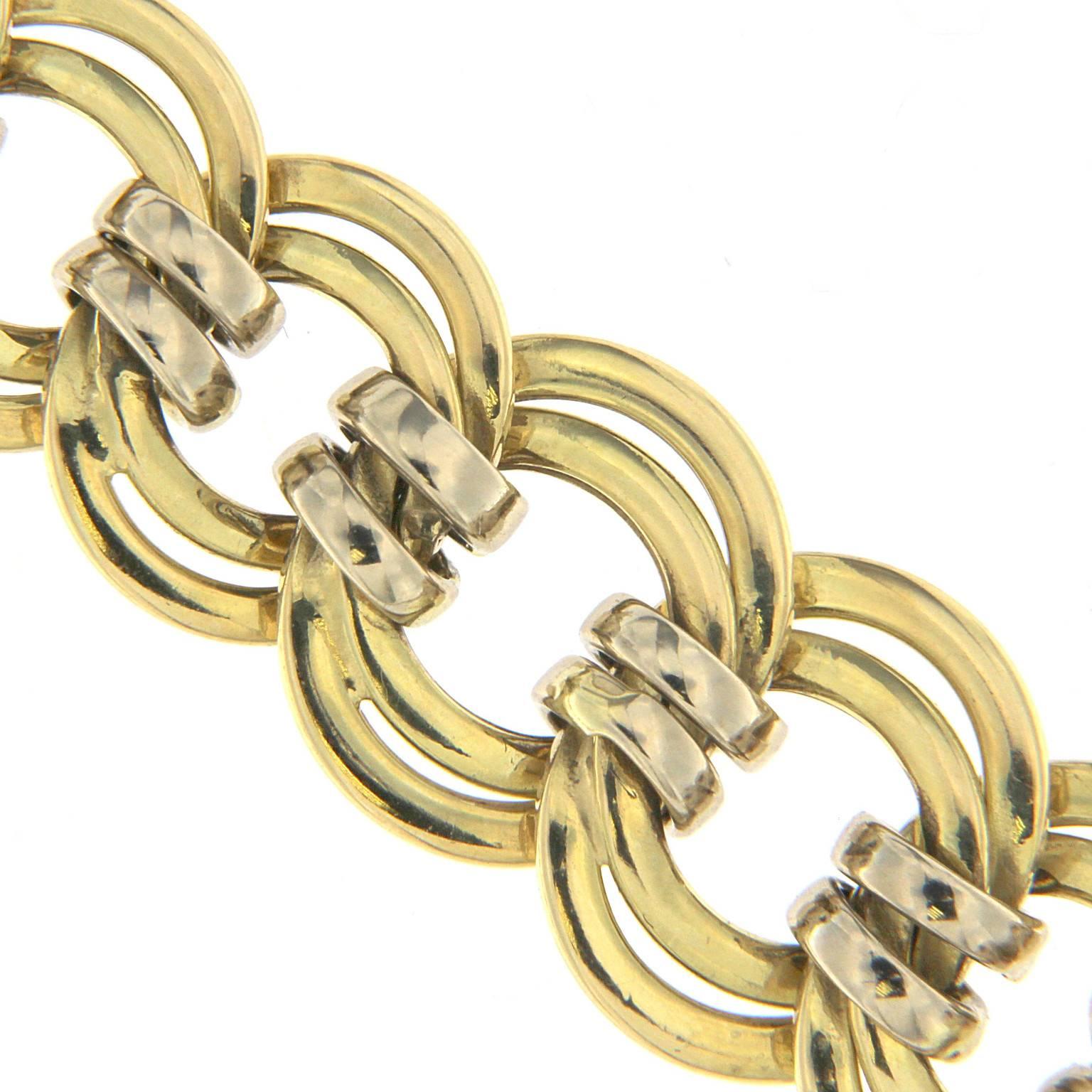 Chained necklace with double wire groumette enriched by double wires that overlap the design of the groumette so realizing a very refined design effect.
18 kt yellow gold - Total weight :  GR 28.70
Stamp 750
