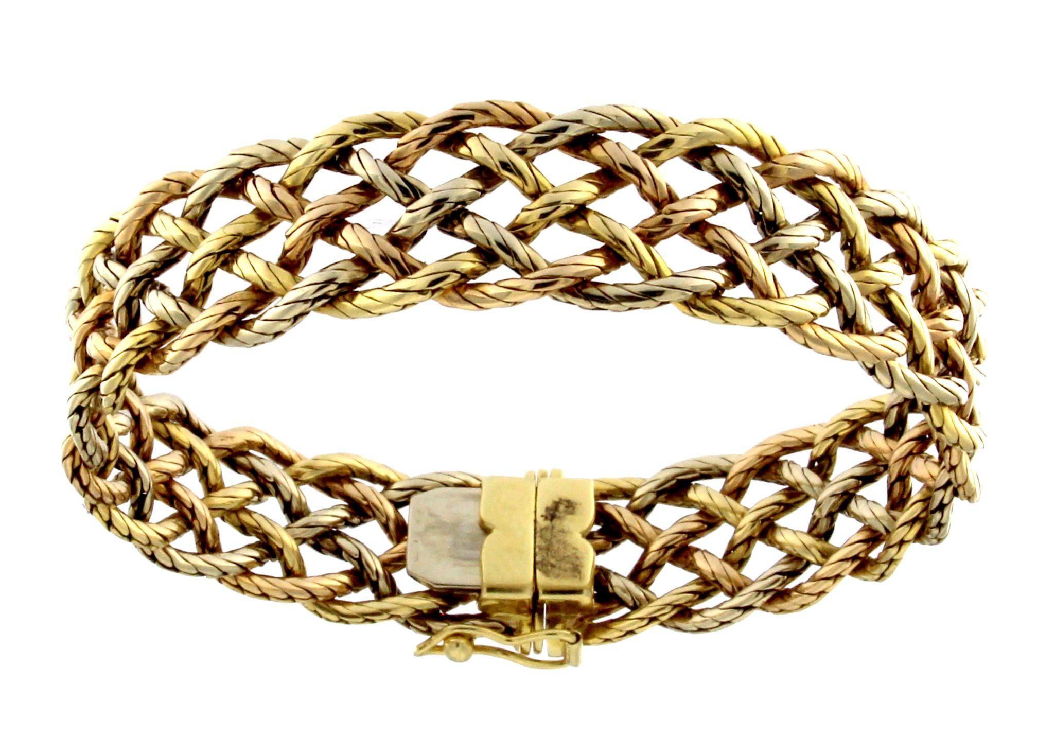 Small size mesh bracelet in three color gold
6 wires 18 KT GOLD mm. 20 linear with ratchet closure 
Total weight gr 47,2
Stamp ITALY 10 MI 750