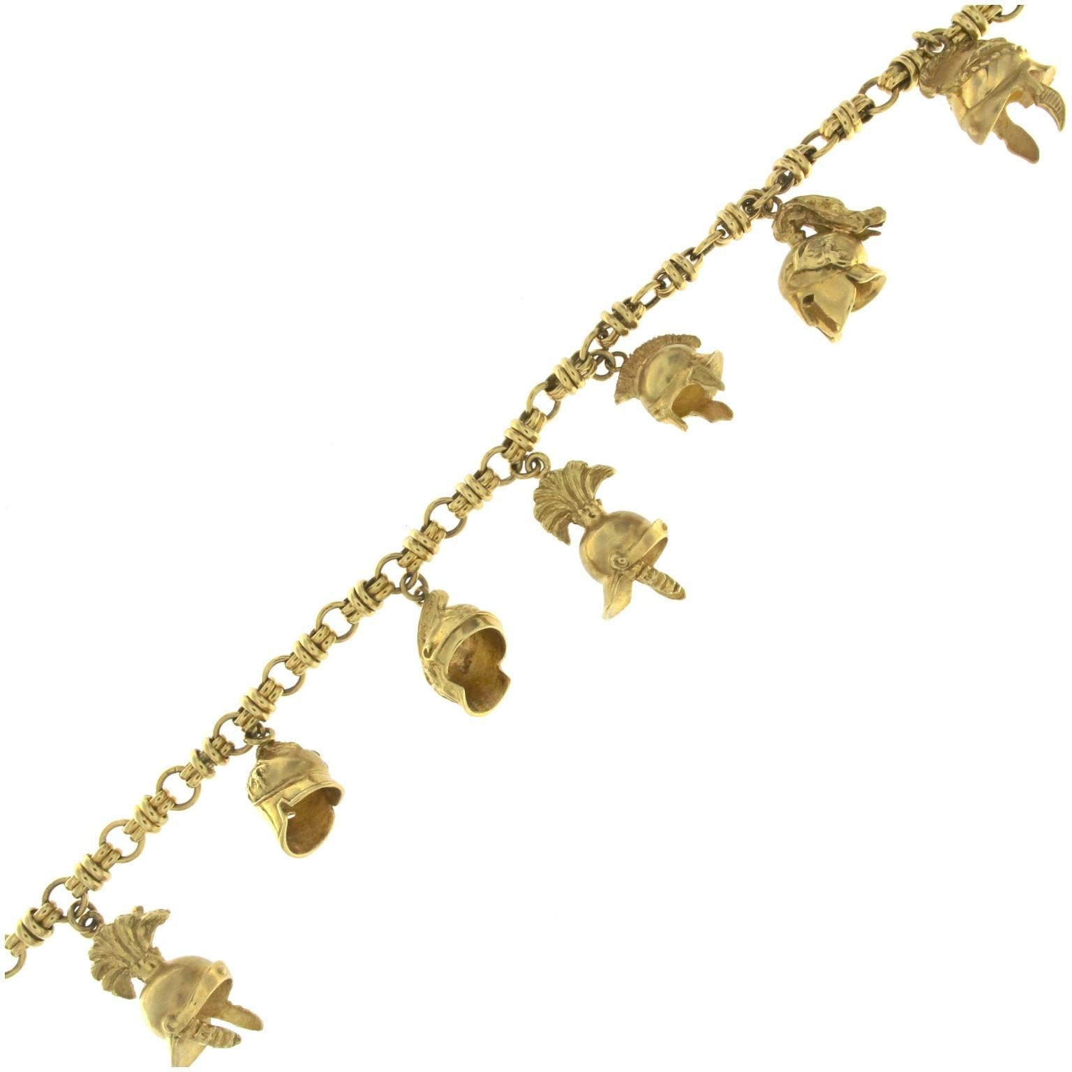 Yellow gold necklace from the Athens collection, the various charms recall ancient Greece and were finely reproduced by a sculptor
The total weight of the gold is GR 88,00
Stamp 10 MI 750

