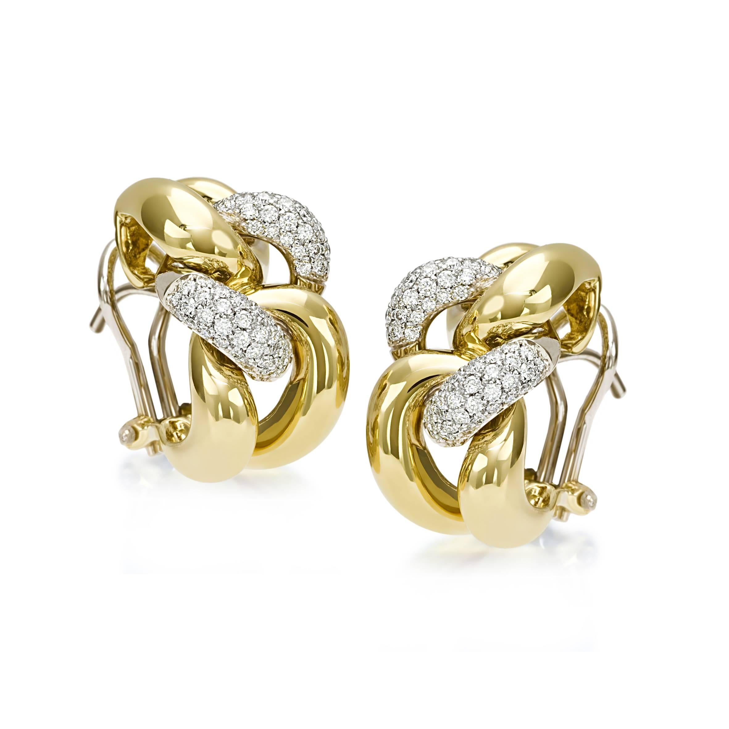 Presenting a stunning pair of classic groumette earrings from the iconic Micheletto collection, beautifully crafted in 18 kt yellow gold. These earrings embody timeless elegance and are designed to complement any ensemble, making them an essential