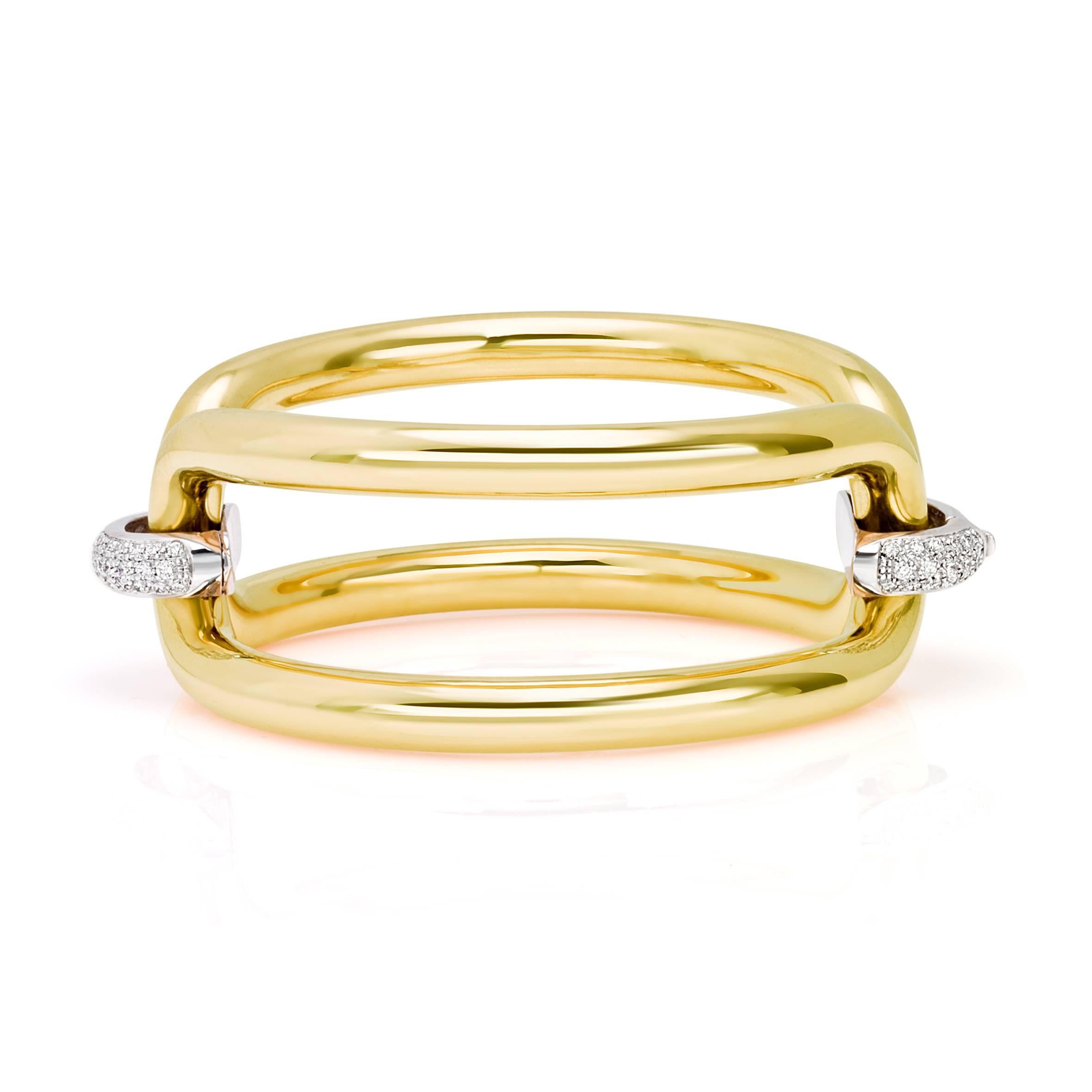 Roberta collection bangle in 18 kt  yellow and white gold and white diamonds 
The newest and more popular collection of his year

the total weight of the gold is  gr 56.20
the total weight of the white diamonds is ct 2.81 - color GH clarity