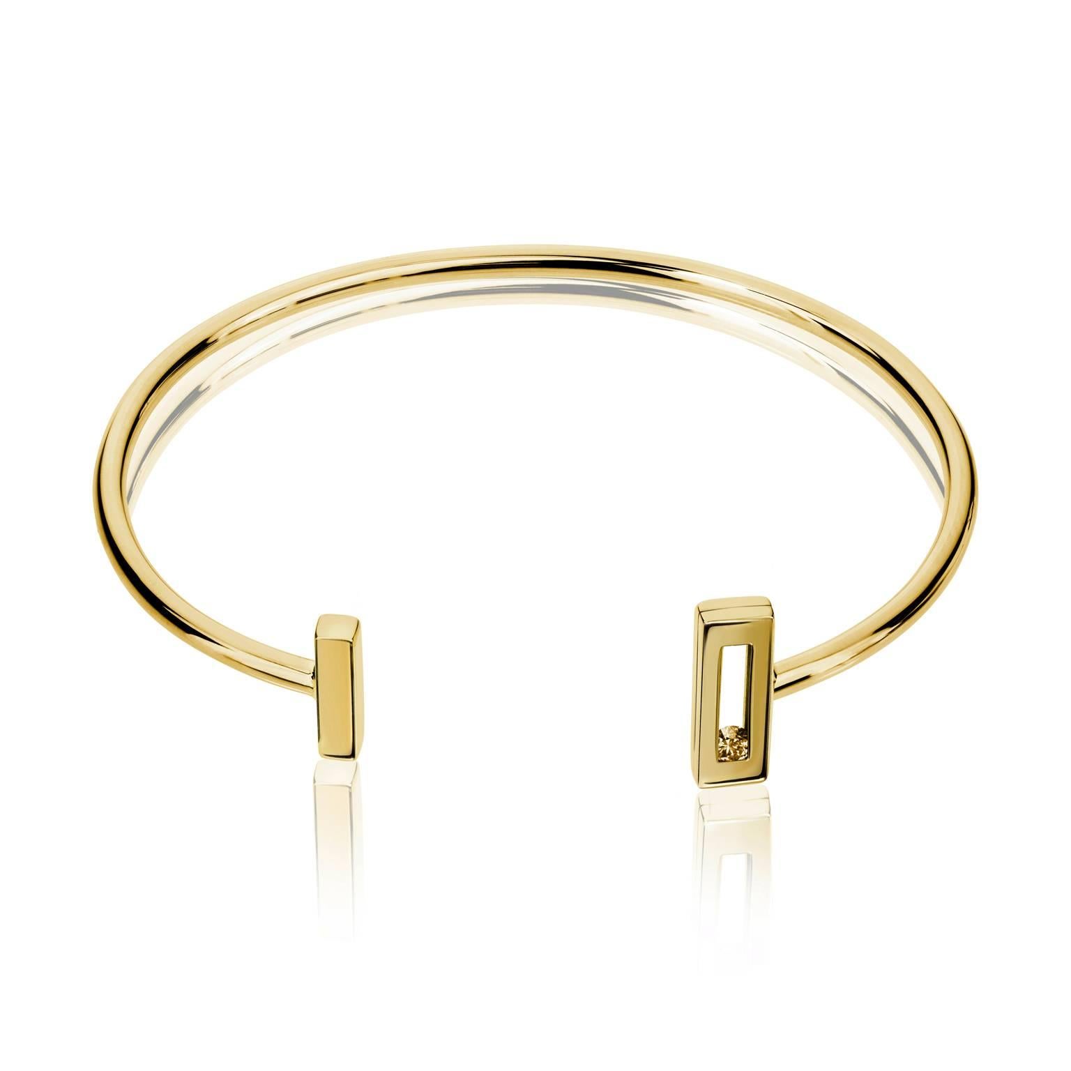 The Slide Collection was inspired by Luke's original award winning SLIDE ring, which won the Lonmin Design Innovation Award in London in 2013. This fine jewellery collection features beautifully simple forms in solid 9ct gold and a signature sliding