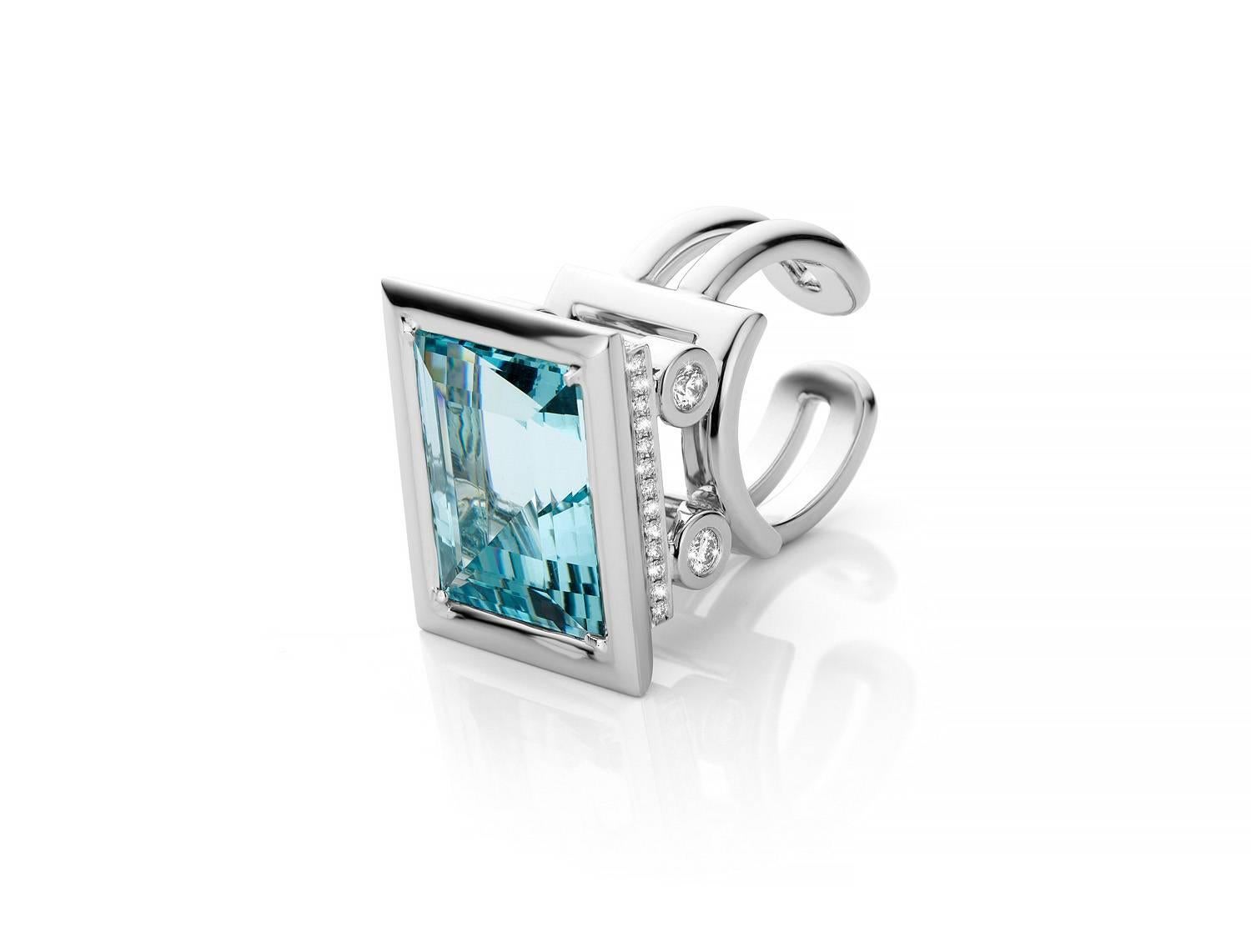 One of a kind very big ring set with a flawless aquamarine and finished with diamonds. 