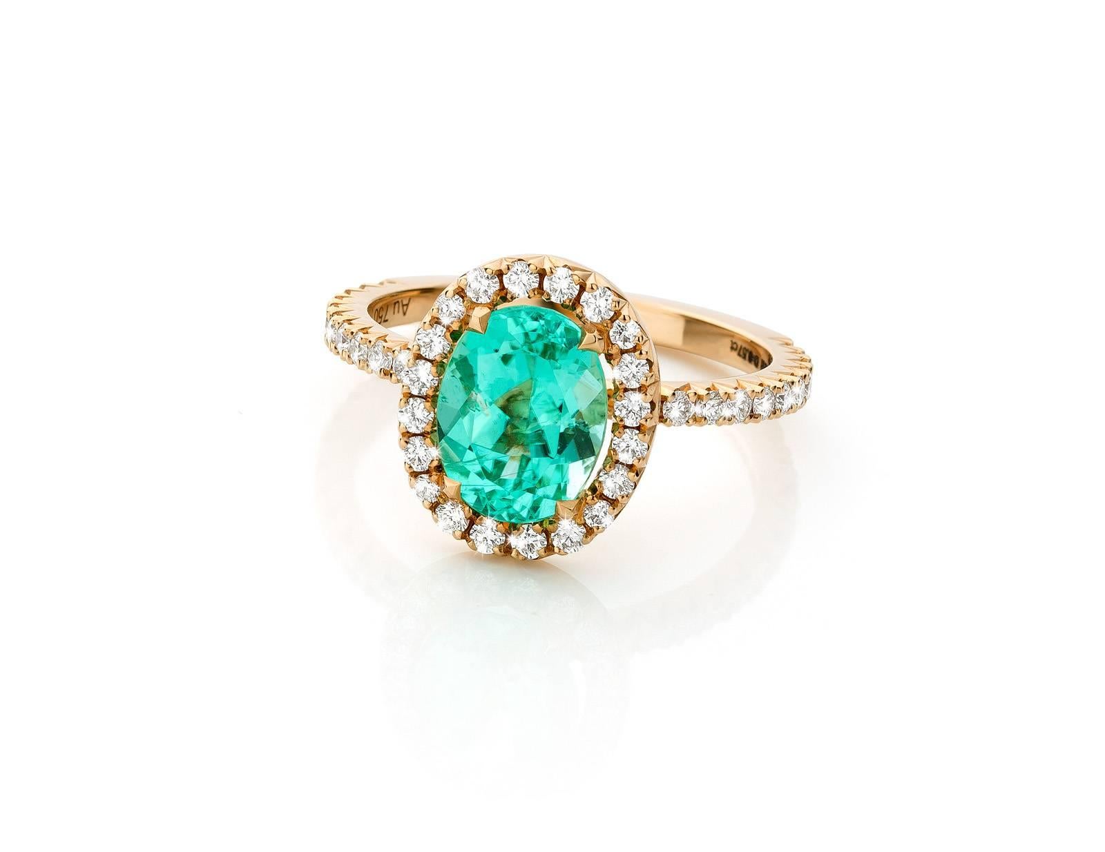 Paraiba tourmaline : 1,97 carat oval measuring 9 x 7 mm
Diamonds 0,62 carat VVS1 quality DEF color

This ring is made in Belgium and set with top quality diamonds. These diamonds are calibrated and from collection grade. 
The setting of the diamonds