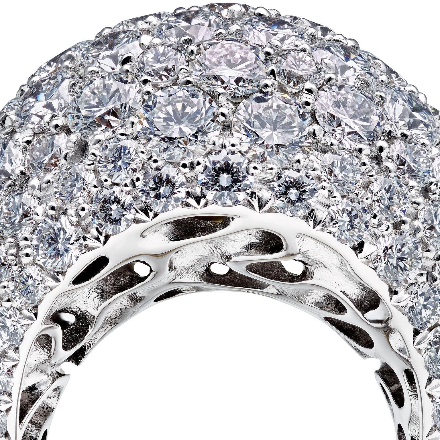 This voluminous dome right hand, or cocktail, 18 Karat white gold and diamond ring designed by Towe Norlen in 2015, has 176 hand set Top Wesselton (TW vvs) high quality diamonds. In total 15.6 Carats. Its highest point from the dome to the finger,