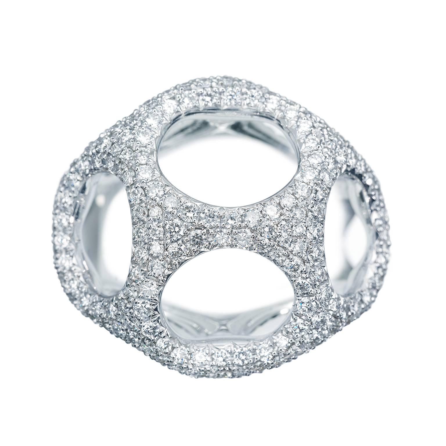 This beautiful pave-set right hand, or cocktail, 18 Karat white gold and diamond ring designed by Towe Norlen in 2008, has 256 hand set Top Wesselton (TW vvs) high quality diamonds. In total 2.15 Carats. The ring reaches at the highest point 14 mm