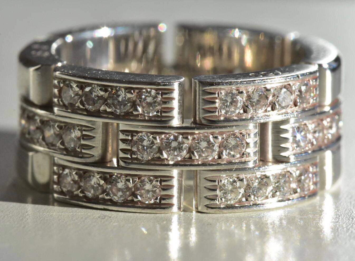 A Cartier Maillon Panthere three row half diamond ring set in 18k yellow gold. The is from the Cartier Panthere Links & Chains collection and features 35 pave set brilliant cut round diamonds in a link style band. The ring currently retails on