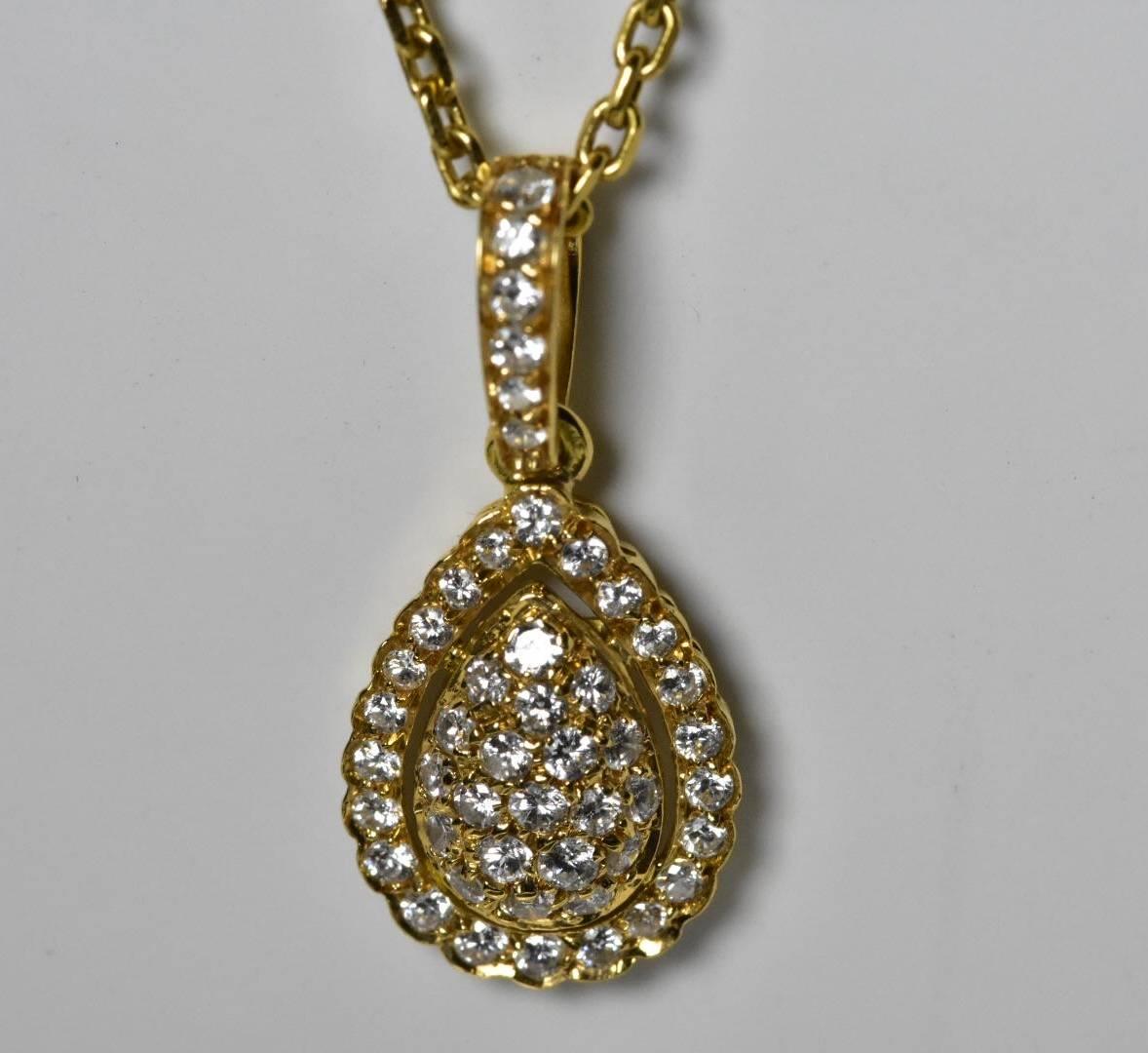 A beautiful Cartier Diamond Pendant Necklace necklace set in 18k yellow gold. The necklace features a pendant with forty-seven pave diamond of approx 0.90 carat weight. 
Lenght: 16.2 inches 
Hallmarks:  Cartier 750 reference 108914
Diamond weight: