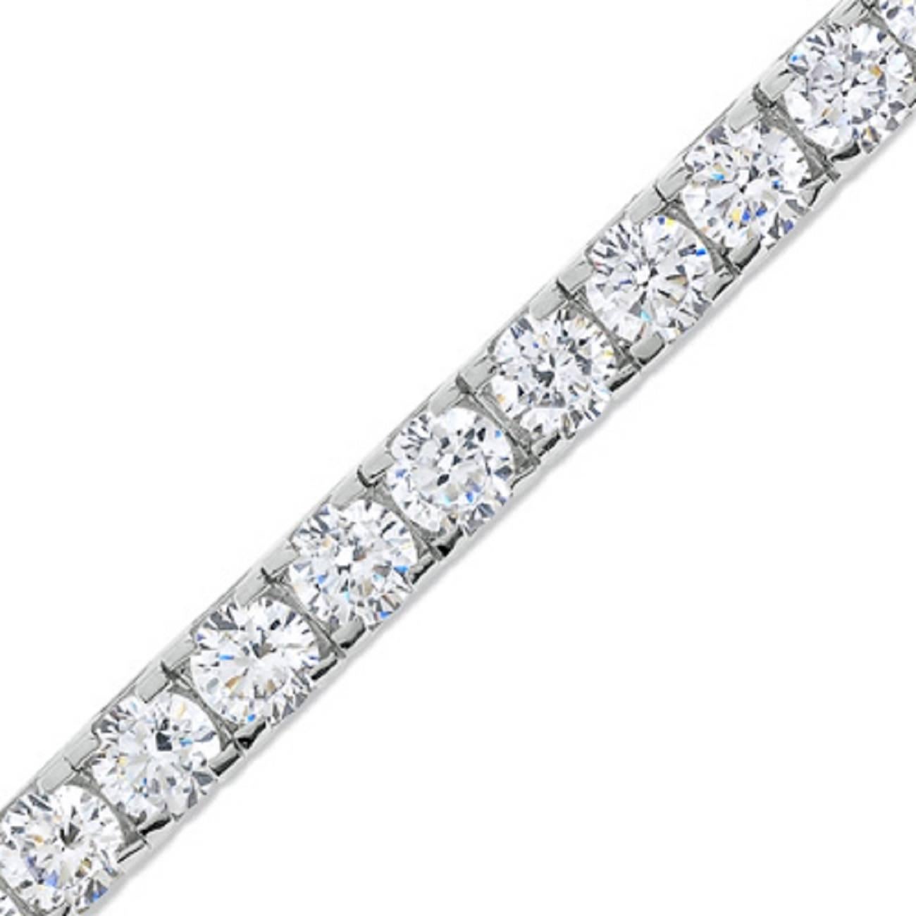 This beautiful Diamond bracelet is set on a 14k white gold.
The color is G-H and the clarity is SI

We have one week return policy, if you are not satisfied with the item, plus, a life time guarantee for any upgrade you would ever want.
