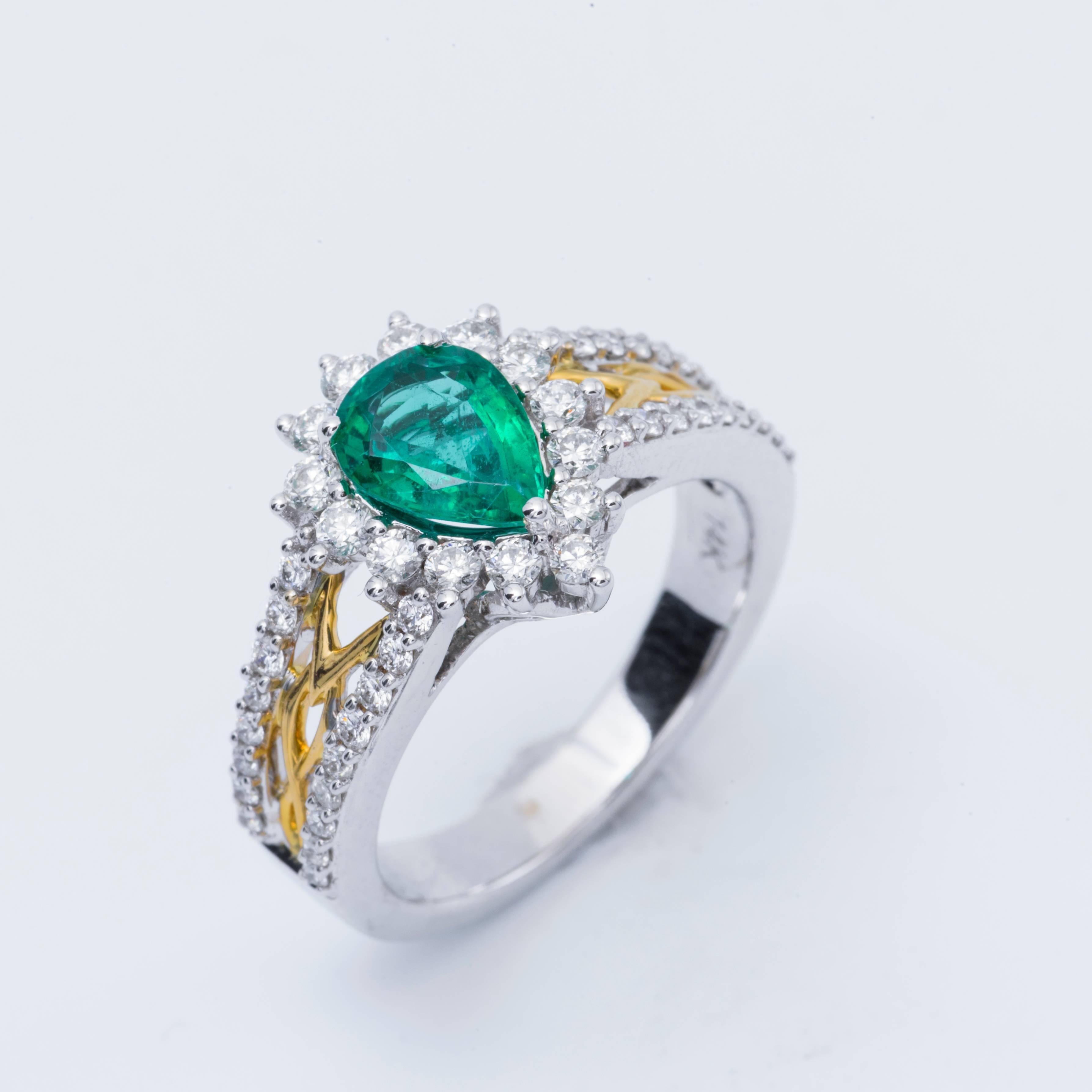 14 K White and Yellow Gold.The Zambian Emerald measures 7x6 mm and weighs 0.96 cts. The diamonds weight is 0.68 cts.
Its a gorgeous  classic timeless ring!!!
Size of ring 6.5 ( can be sized)
