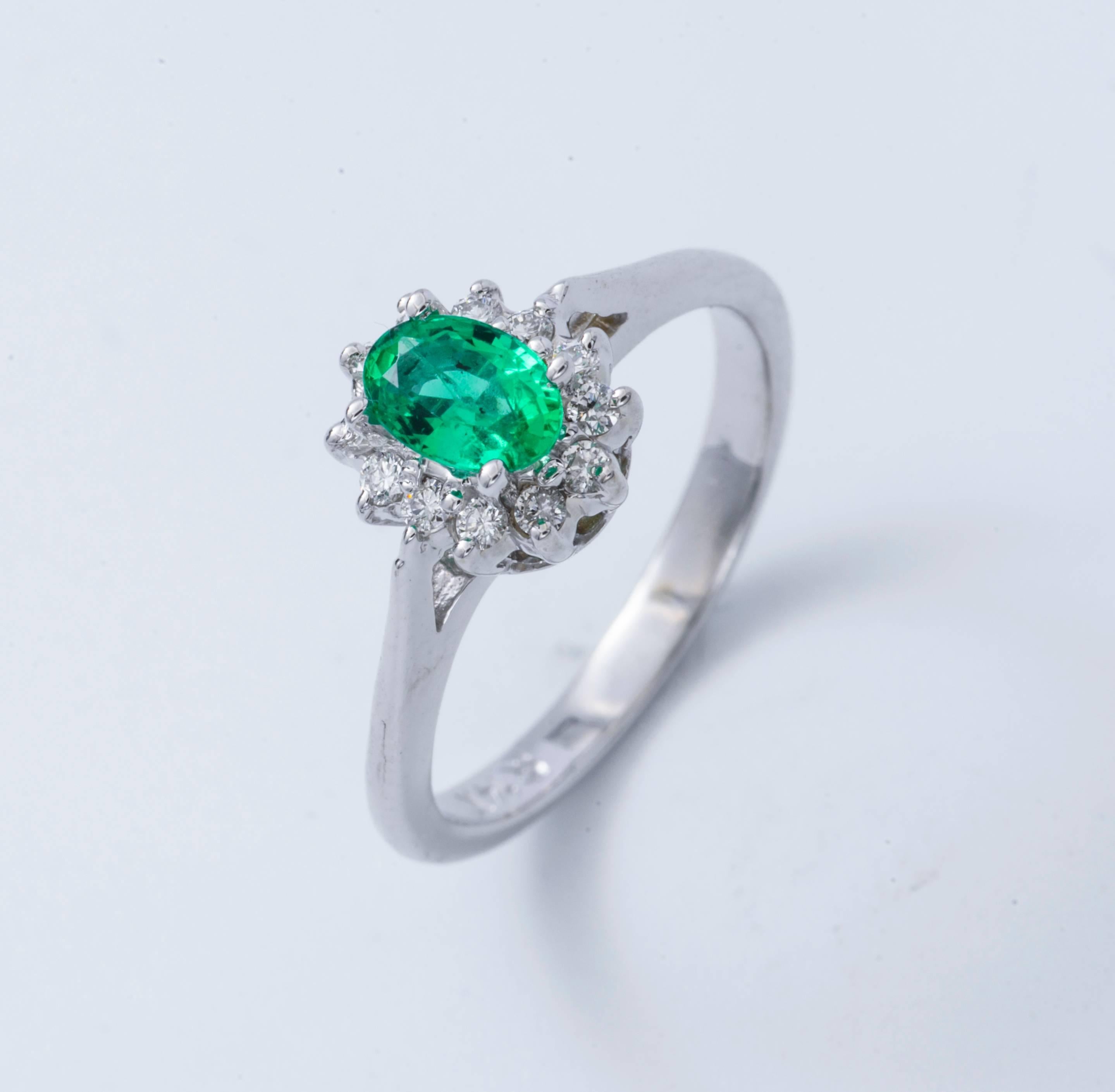 Material: 14k White Gold
Gemstone Details: 1 Oval Shape Emerald approximately 0.43ct. 6x4  mm
Diamond Details: Approximately 0.16 ctw of diamonds. Diamonds are H in color and SI in clarity.
Ring Size: 6.50 (can be sized)