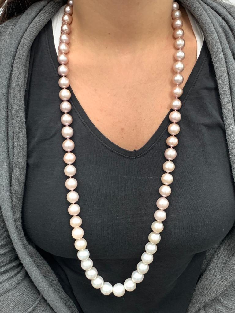 
Pearl Size	13-15mm
Nature	South Sea/Freshwater Cultured Pearl
Pearl Quality	AA
Pearl Shape	Round
Luster	AA, Excellent
Nacre	Very Thick
Jewelry Style	Necklace
18K Pave Diamond Clasp 1.75 cts.
Approximately Opera Length.
