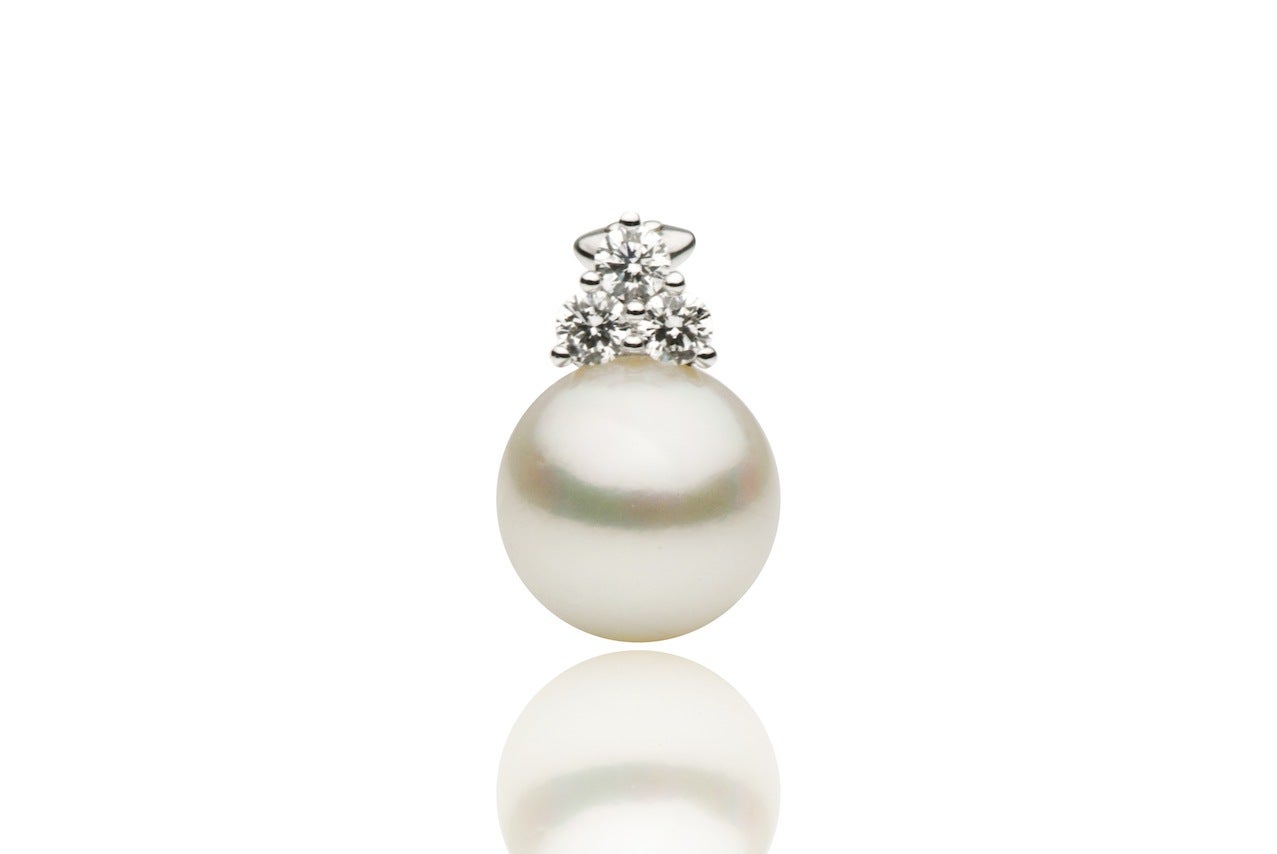 White Gold 18k
Pearl Size: 12-13mm
Nature: South Sea Cultured Pearl
Pearl Quality: AAA
Nacre: Very Thick
Earring Style: Omega Clip
Diamond Count: 6
Diamond Weight: 0.60 cts.