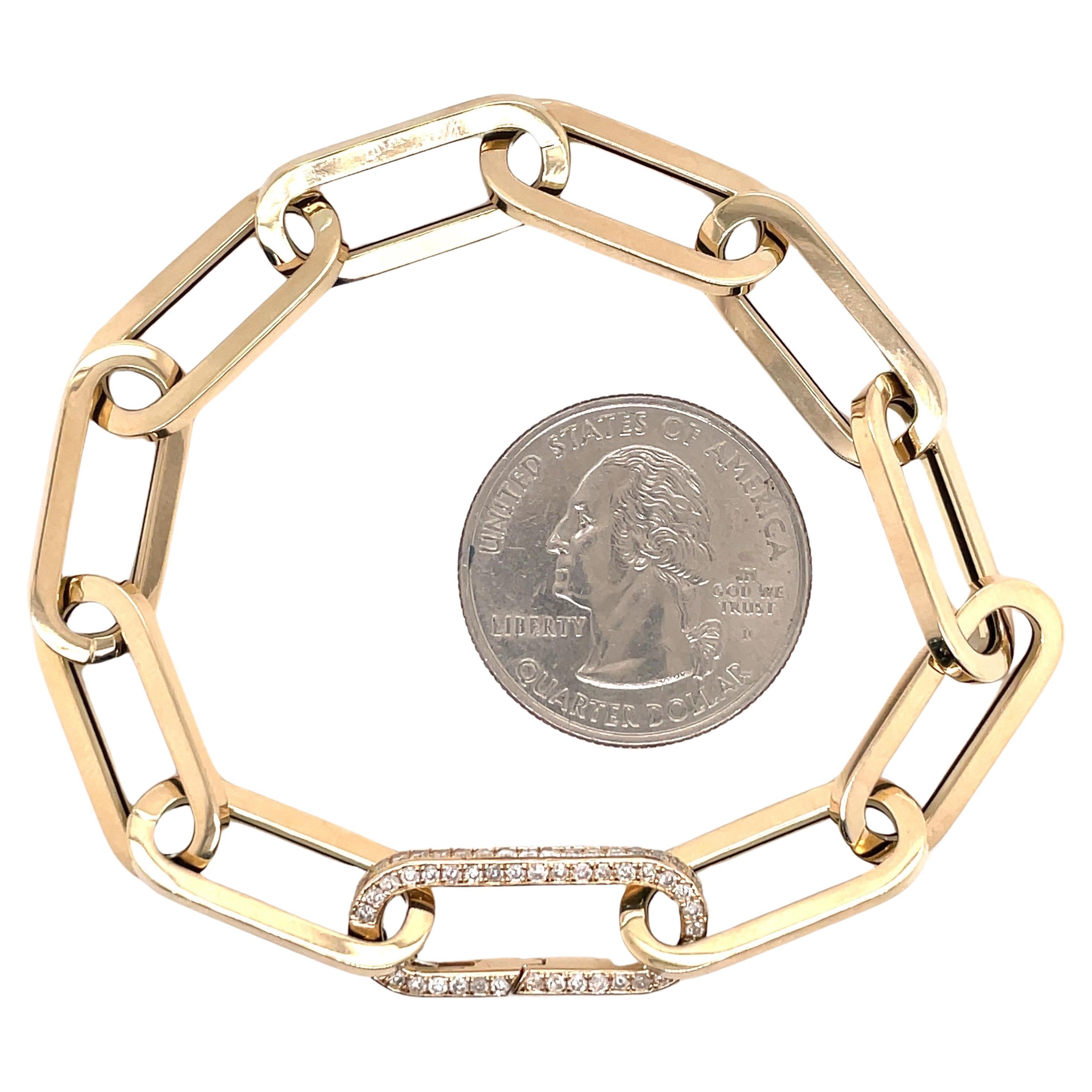Made in Italy, this 14 karat yellow gold features 10 oversized paperclip links with one diamond clasp.

Available in smaller sizes.
Clasp available in white, rose & yellow gold
Clasp available in different styles. 
Gold links weigh 8.4 grams