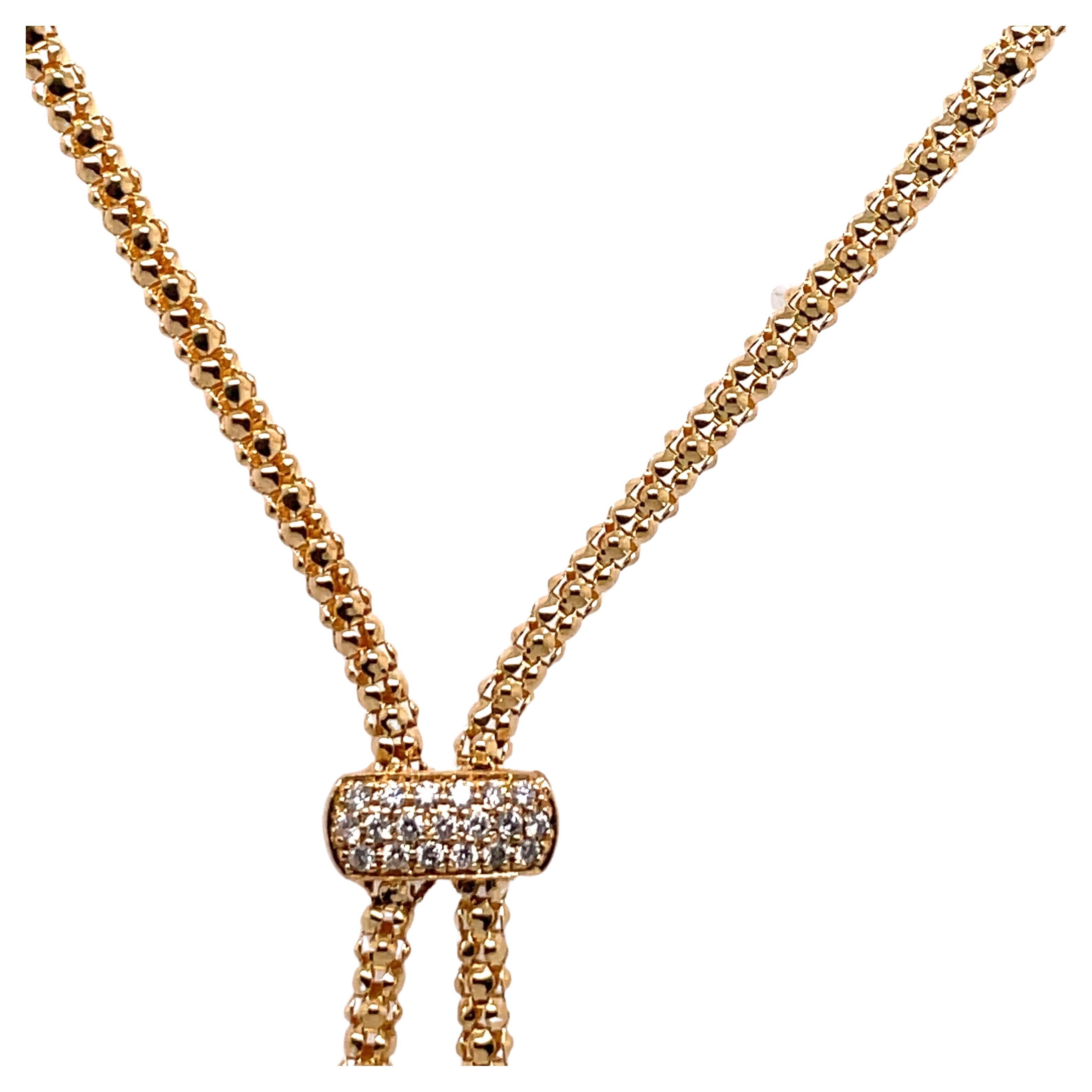 18 Karat Yellow Gold tassel necklace featuring a White & Golden South Sea pearls measuring 12-13 mm and a diamond bar with 37 round brilliants weighing 0.27 carats. 
Chain: 18 inches L
Diamond Bar: 0.13 Inches L
Shortest Pearl: 1 5/8 Inches