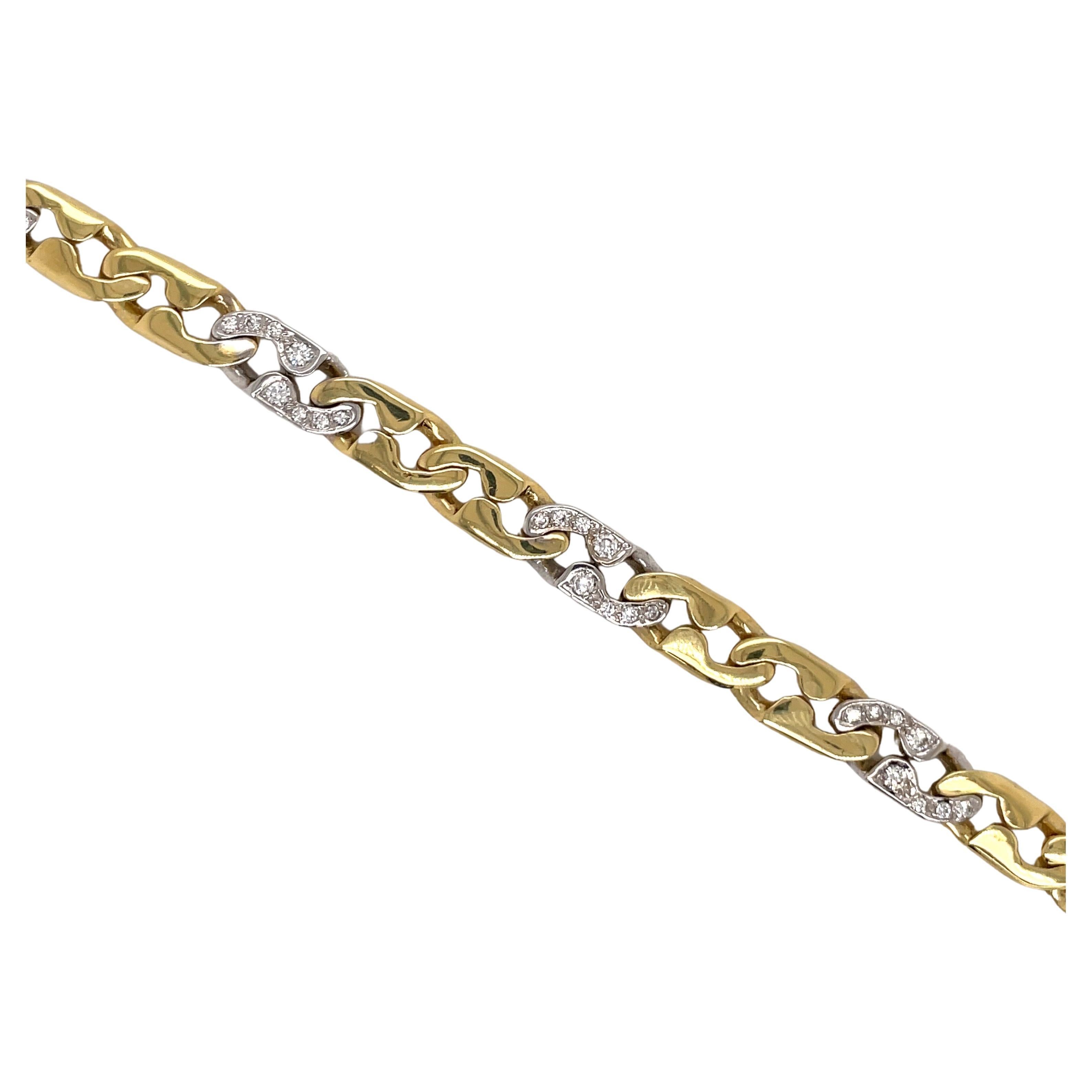18 Karat Yellow & White gold bracelet featuring 6 diamond links weighing approximately 0.60 carats and 12 high polish links, 25 grams.
Color G-H
Clarity SI