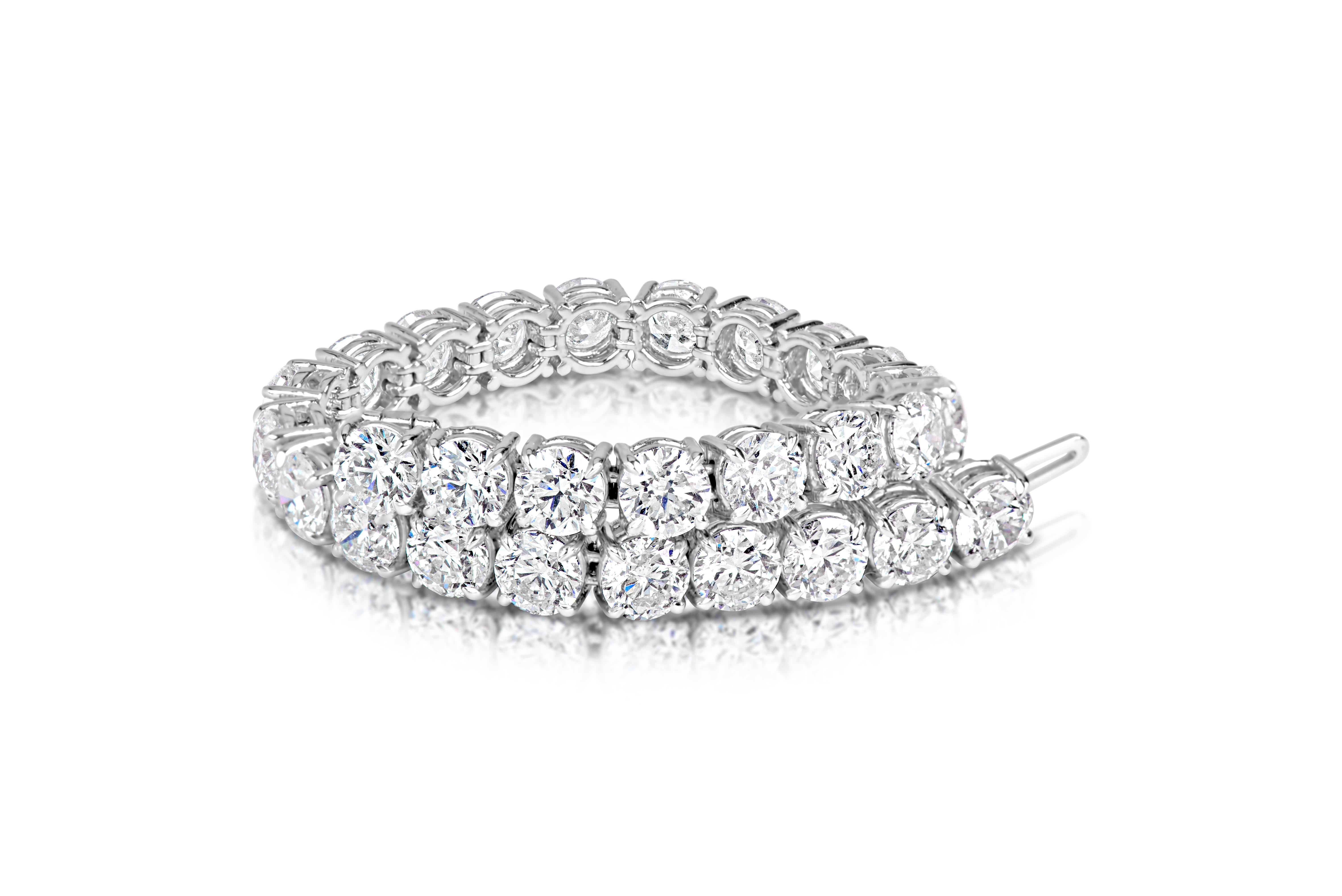 This One of a Kind Bracelet Features:

Diamond Count: 28 Diamond
Diamond Weight: 28.80 Cts.
Average Weight of Diamond : 1.03
Color: H-I
Clarity: SI2

All Stones have been hand selected and beautifully matched to achieve high brilliancy and they are