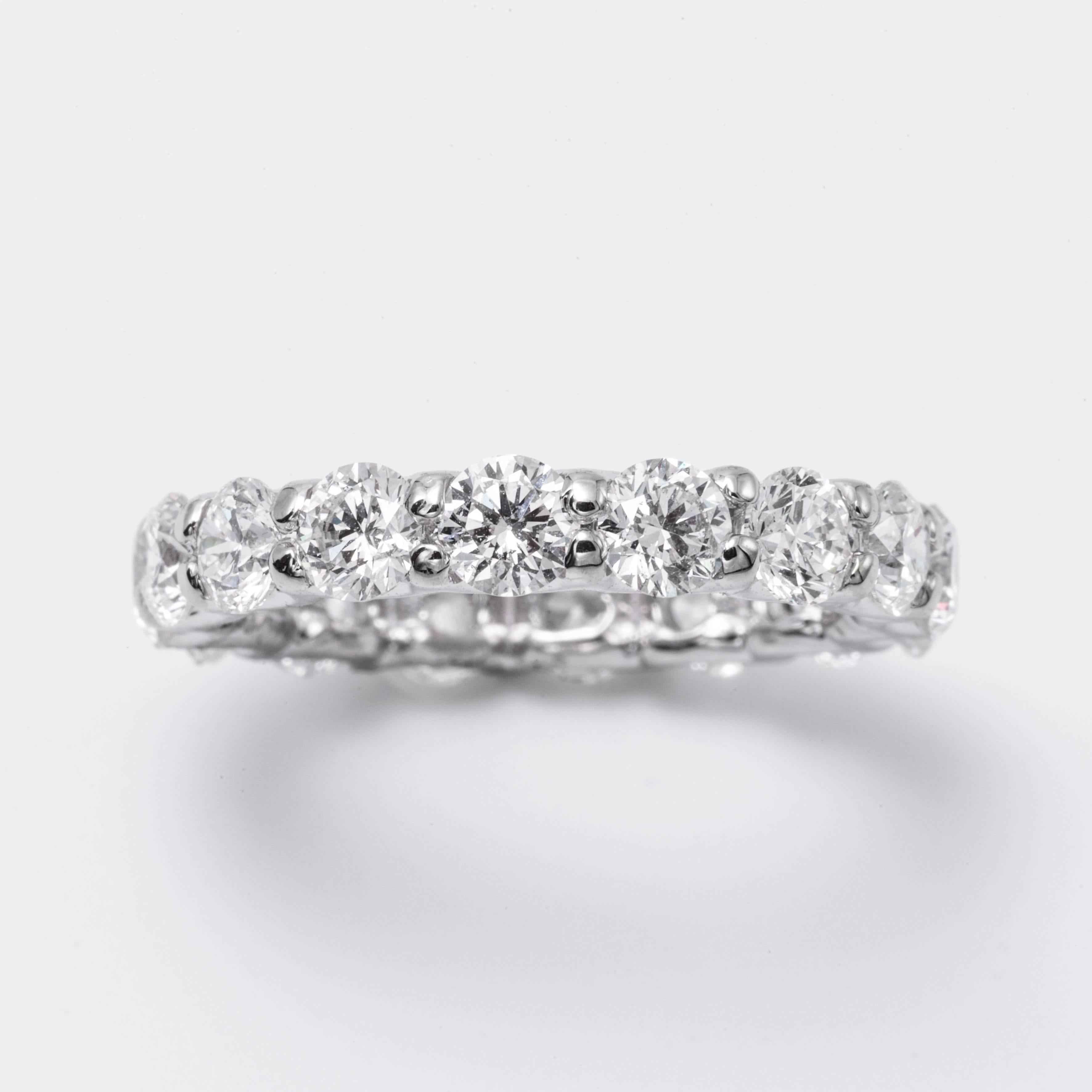 U Setting
14K White Gold 
Diamond Weight: 2.00
Diamond Color: H
Diamond Clarity: SI1
Beautifully sculpted, this diamond ring is crafted in a 14k eternity band design featuring brilliant round diamonds. Total carat weight may vary by ring size.
