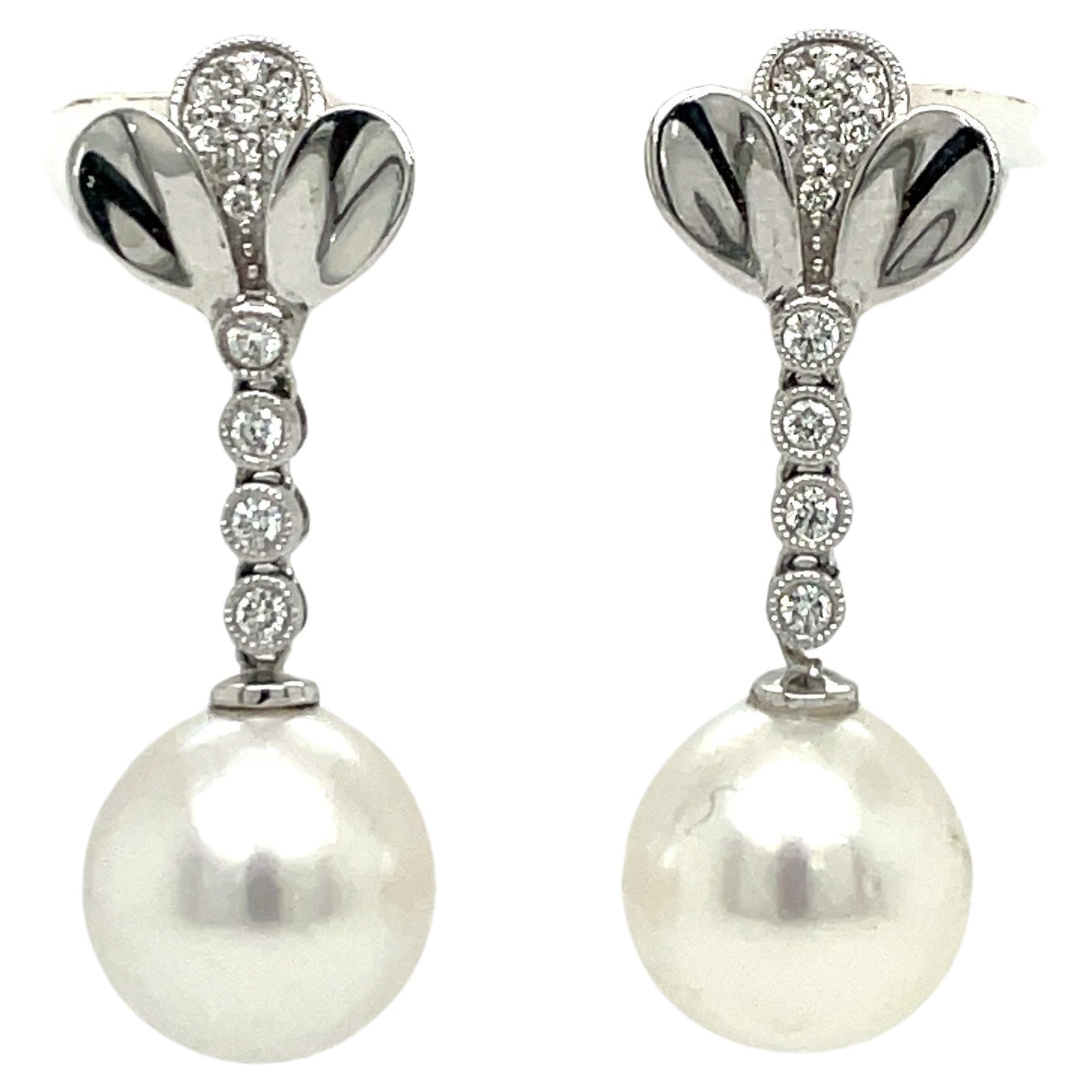 14 Karat White Gold Petal Diamond South Sea Pearl Drop Earrings 0.24 Carats For Sale