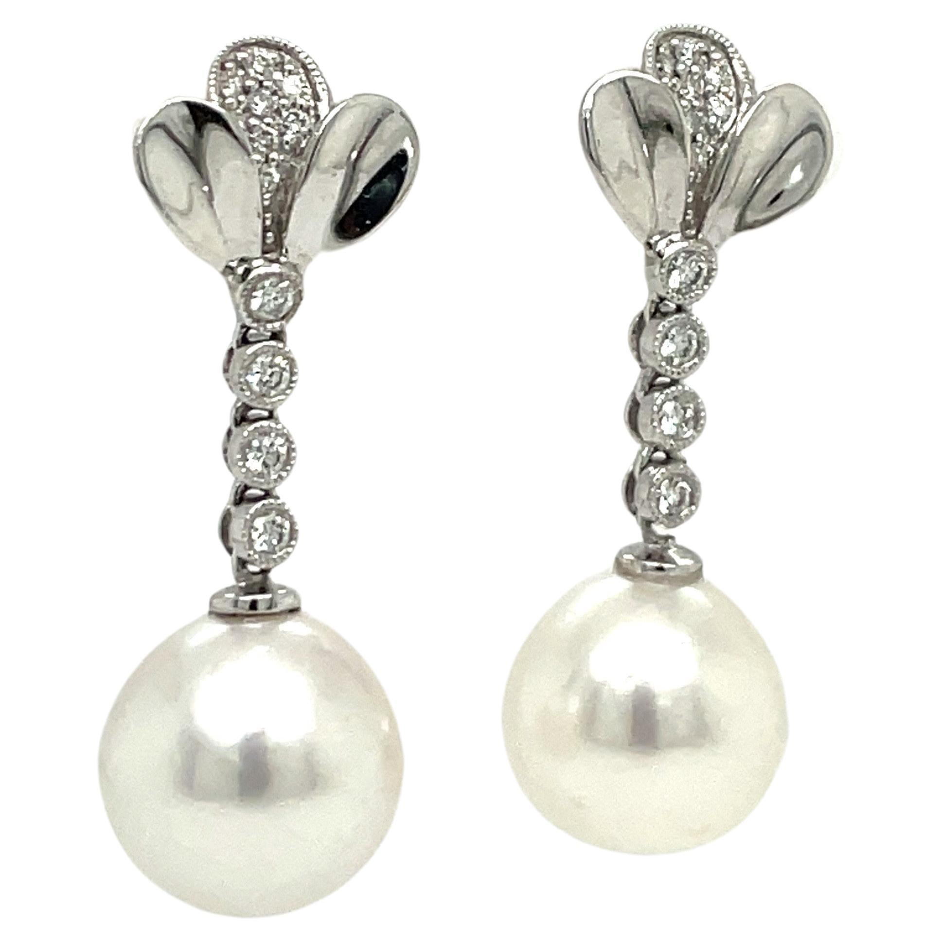 14 Karat White Gold Petal Diamond South Sea Pearl Drop Earrings 0.24 Carats For Sale 1