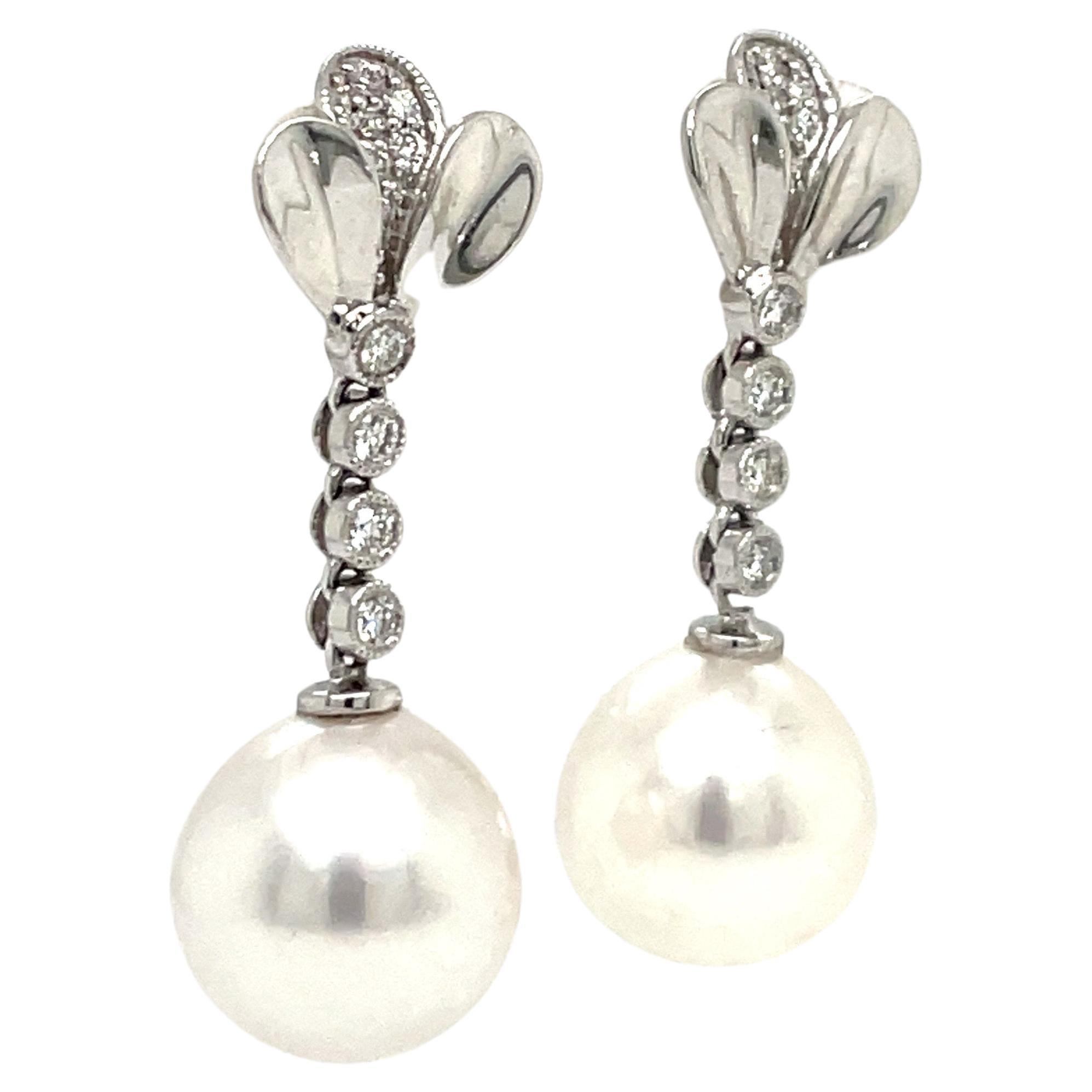 14 Karat White Gold Petal Diamond South Sea Pearl Drop Earrings 0.24 Carats In New Condition For Sale In New York, NY