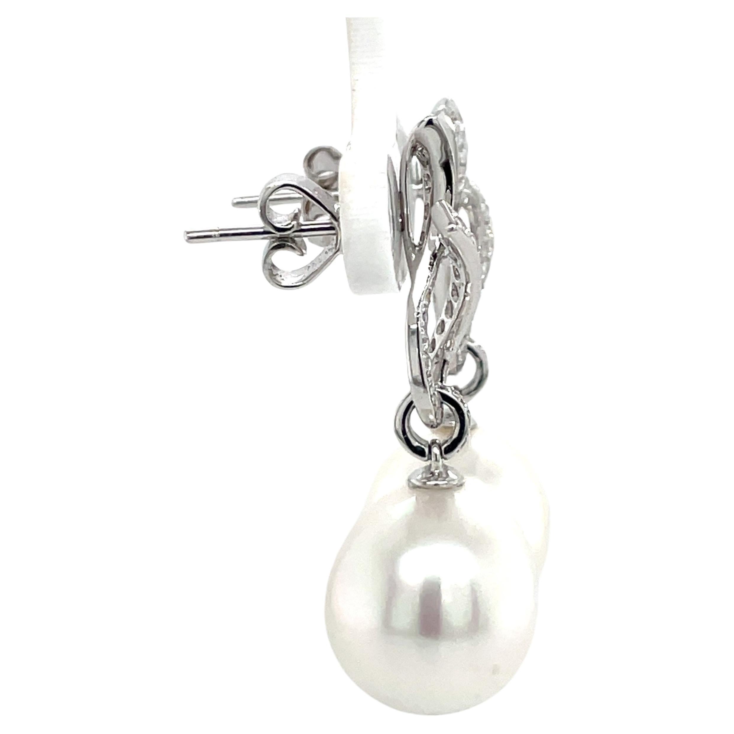18 Karat White Gold Diamond Ribbon South Sea Pearl Earrings .057 Carats For Sale 1