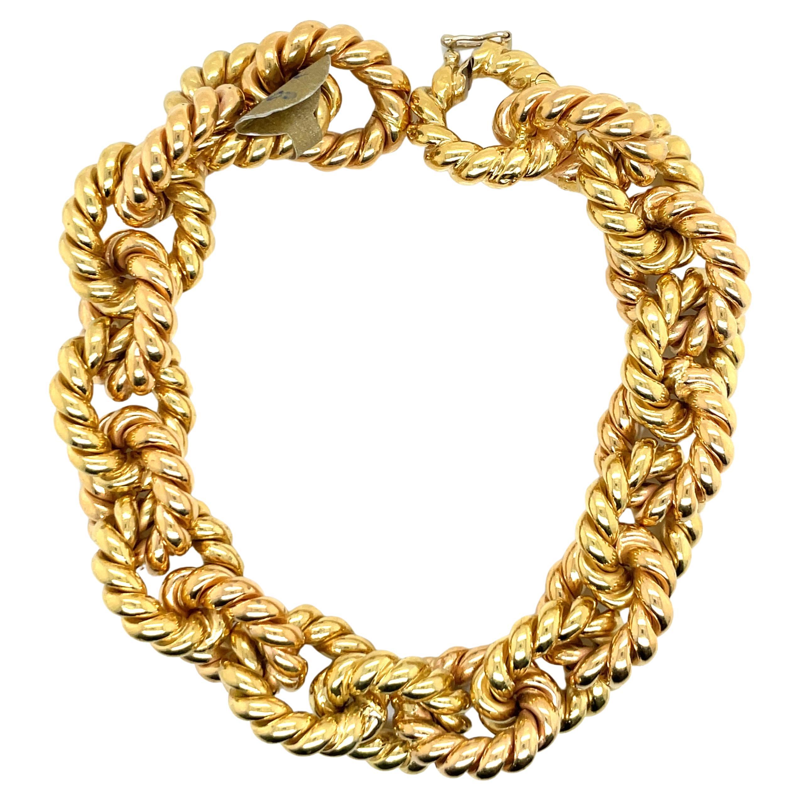 Two Tone Alternating 18 Karat Yellow & Rose Gold Twist Link Bracelet 68 Grams For Sale