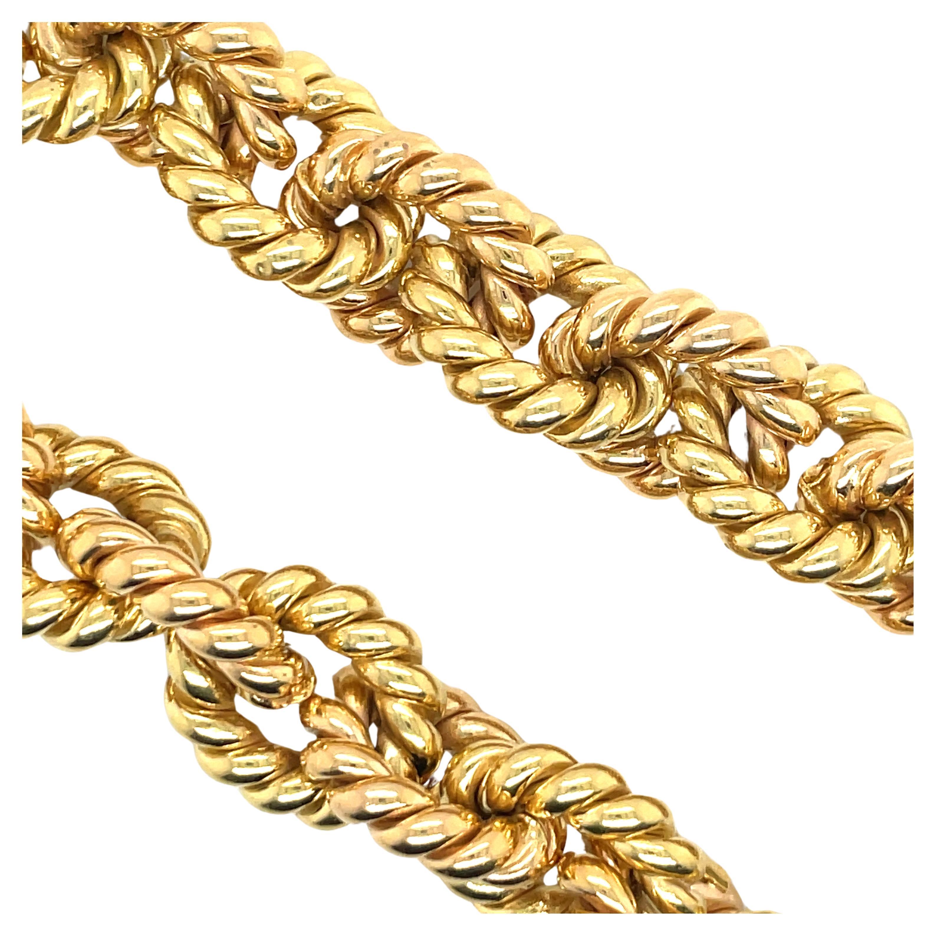 Contemporary Two Tone Alternating 18 Karat Yellow & Rose Gold Twist Link Bracelet 68 Grams For Sale