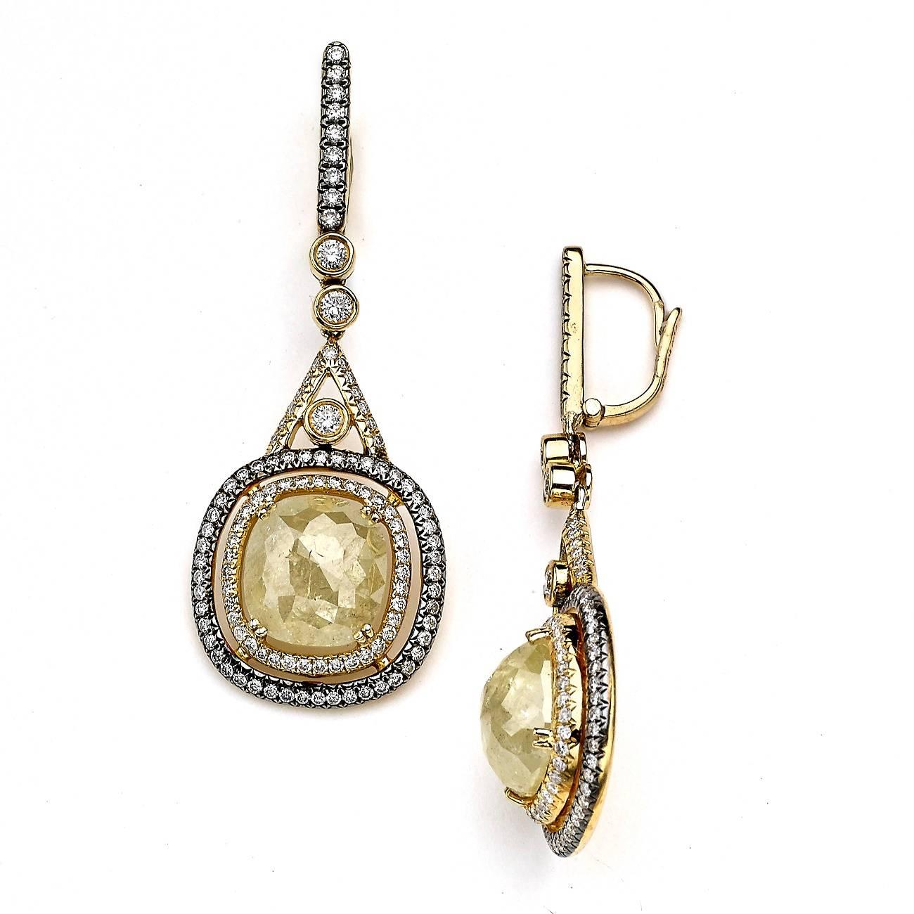 This one of a kind earring is crafted in 18K Yellow Gold centered with A Yellow Rough Diamond and White Gold accent.

Diamond Cut: Round
Diamond weight: 1.79 cts.
Color : H-I
Clarity; SI1-SI2
Setting: Bezel

Diamond Cut : Cushion
Diamond