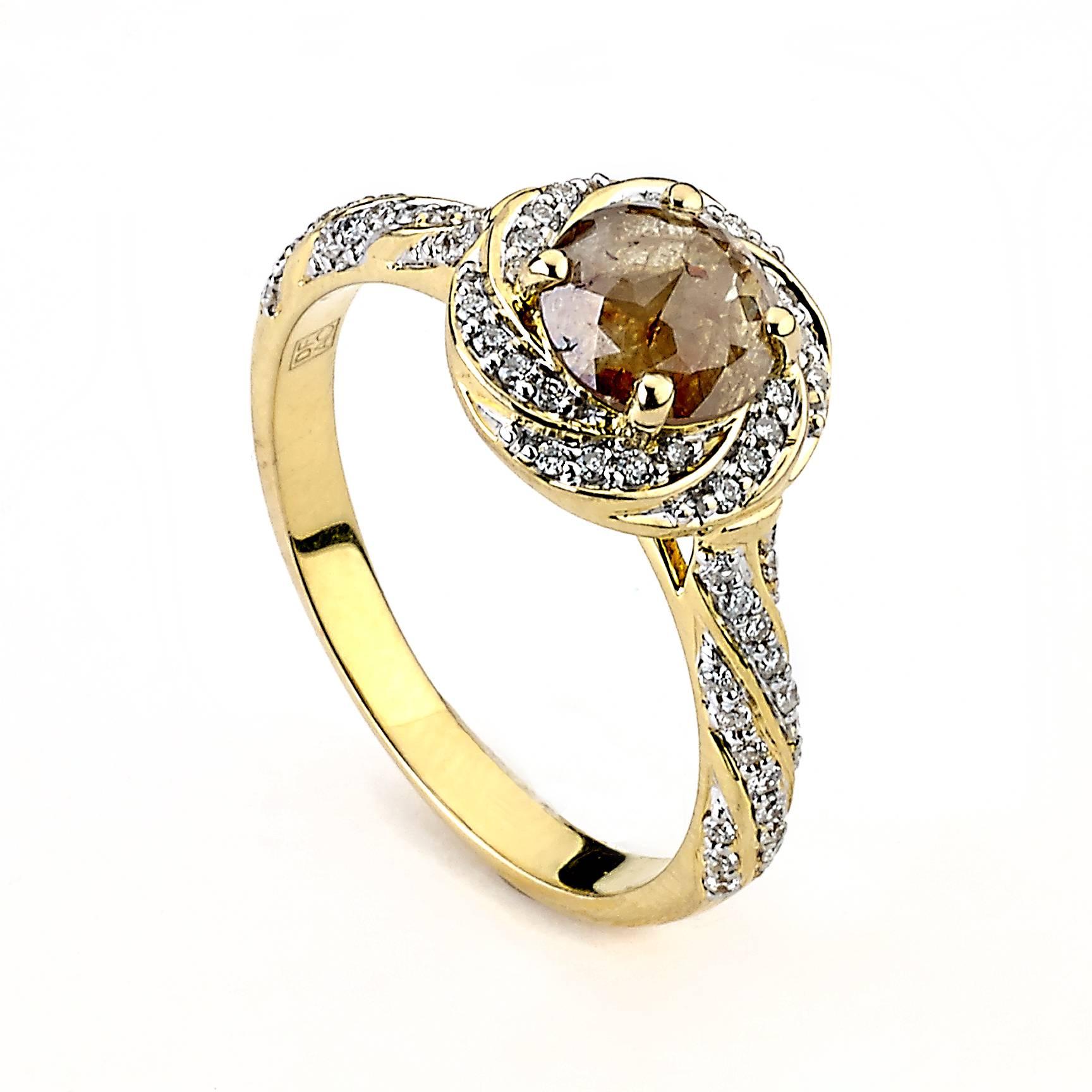 A deep Yellow Diamond is placed atop this ring, surrounded by smaller white diamonds in a Halo and along the band.
Polished 18k rose gold adds more color and class to this jewelry
Metal: rose gold 18k
Diamond Color : H-I White, Yellow
Total