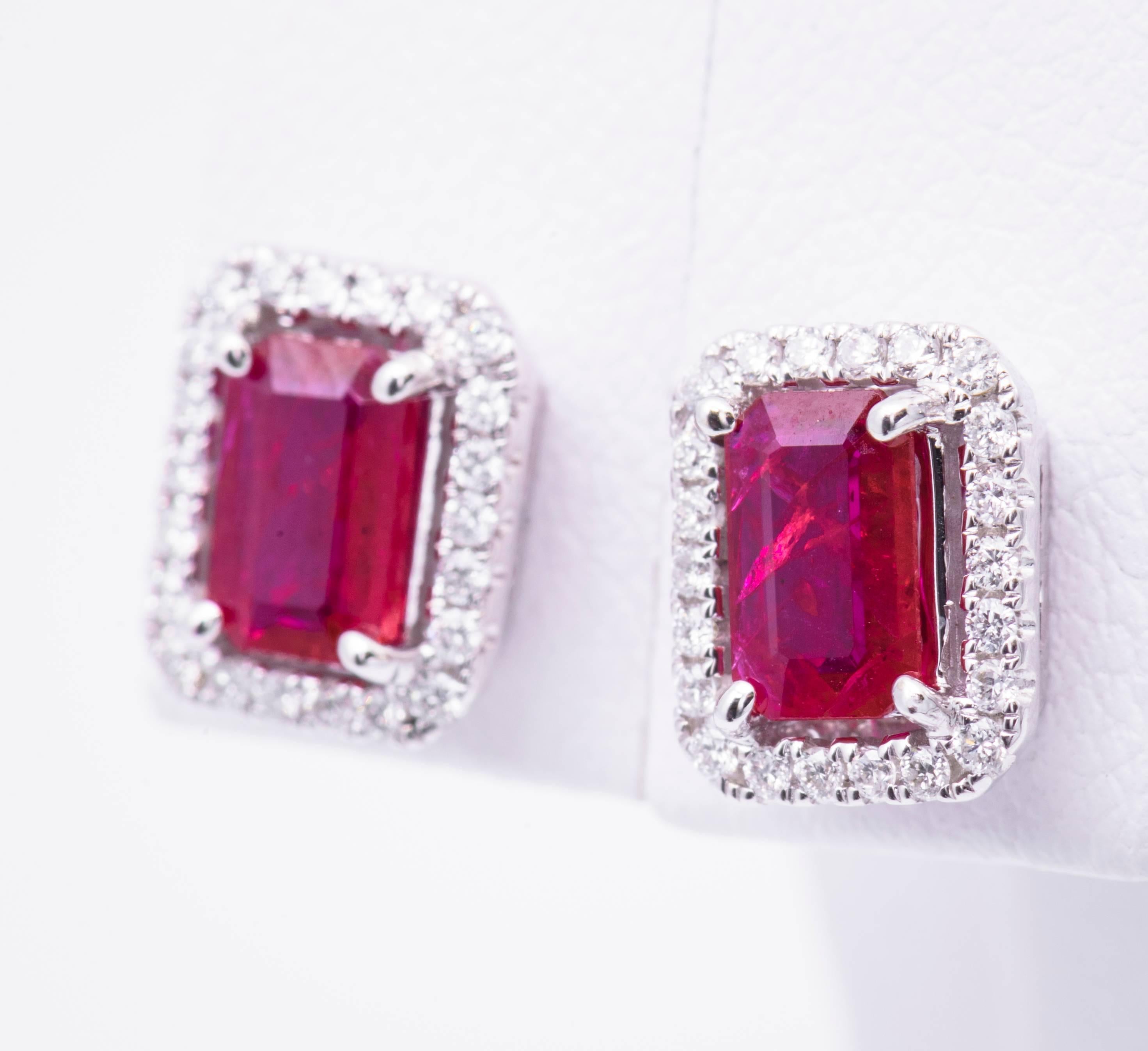 The emerald cut / cushion ruby in these earrings have a total carat weight of 1.06 carats. The diamonds have a total carat weight of 0.19 carats.
The Rubies are 6x4mm
The earrings are 9x7mm