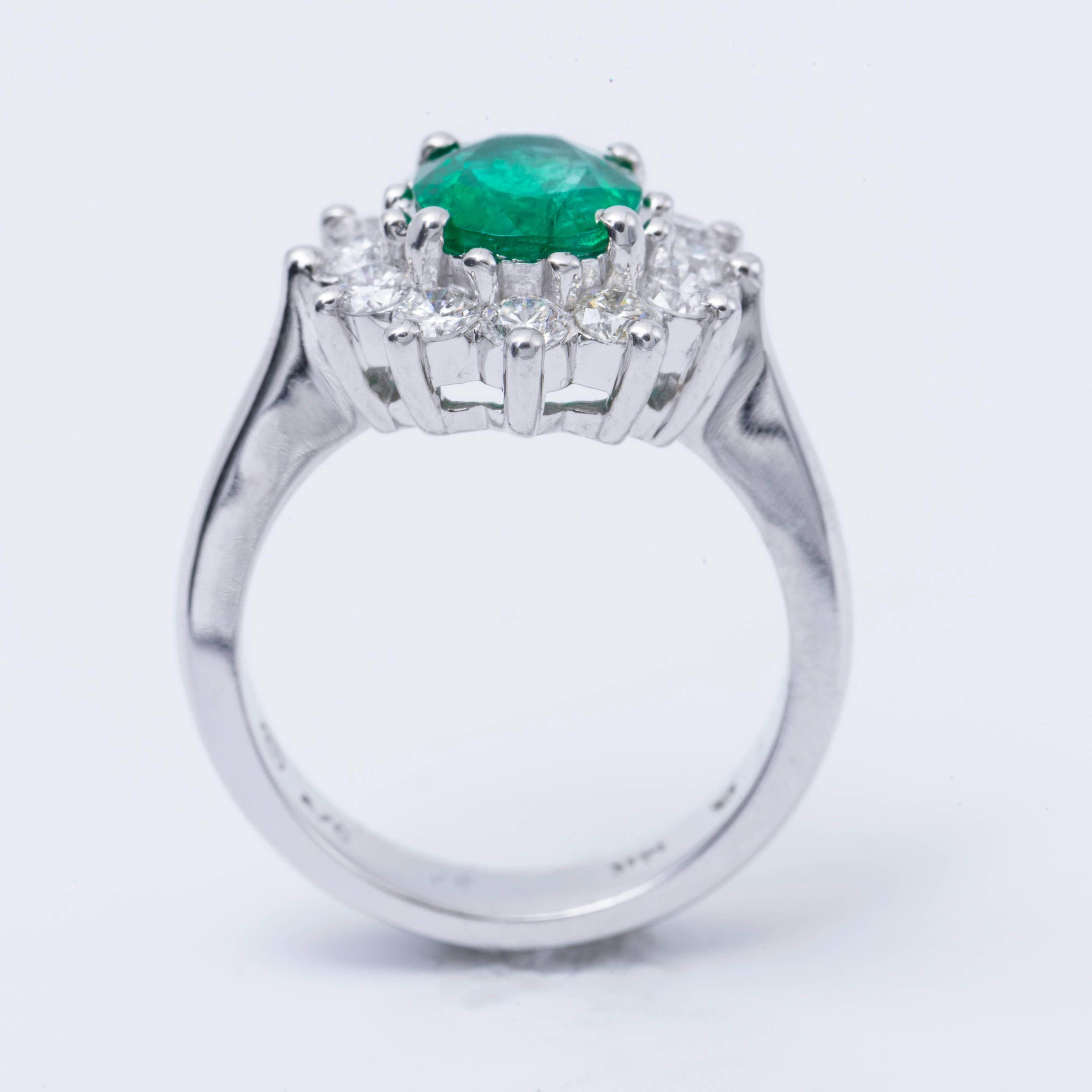 Oval Cut Emerald Ring with Diamonds Halo 14 Karat White Gold