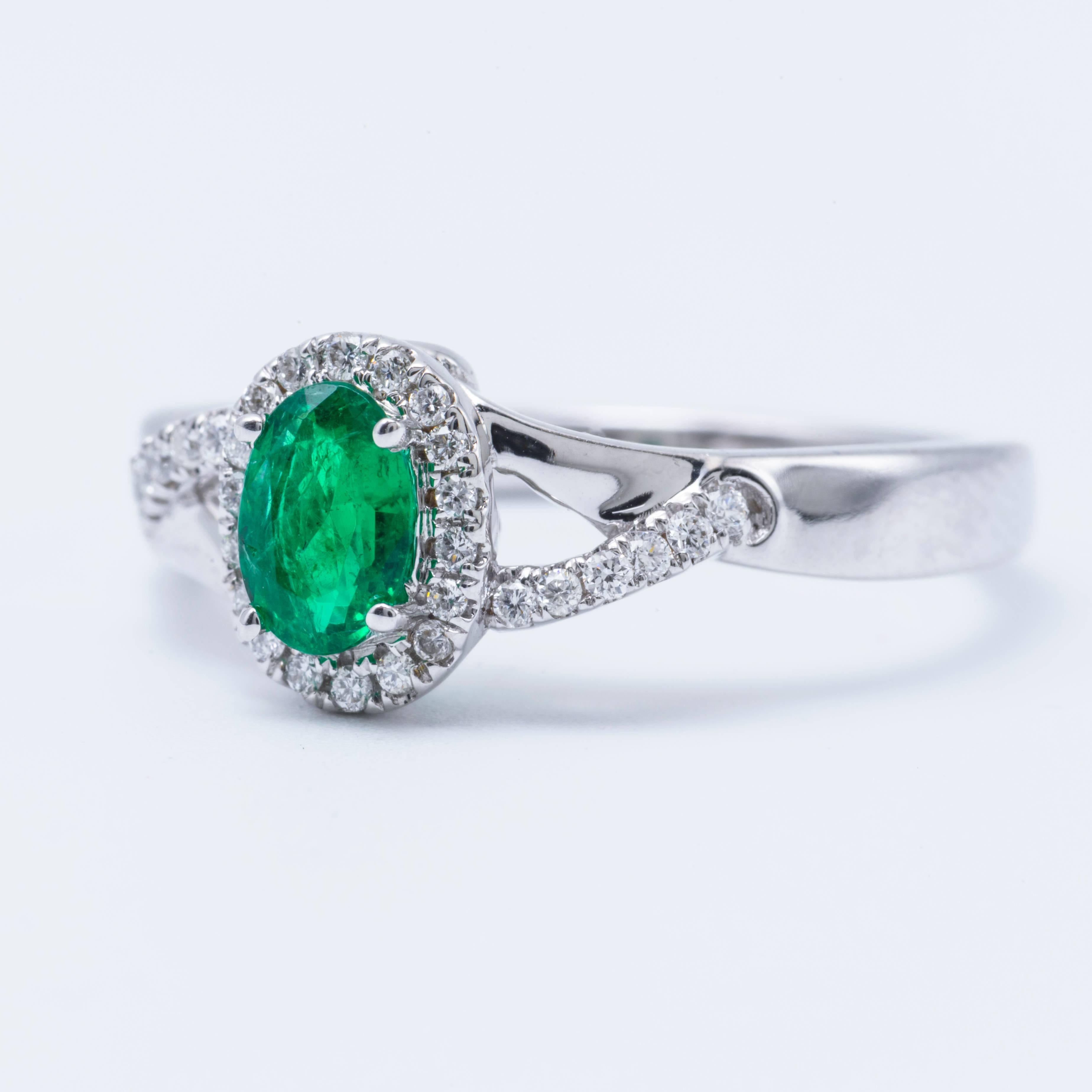 Emerald and Diamond Halo Engagement Ring 1