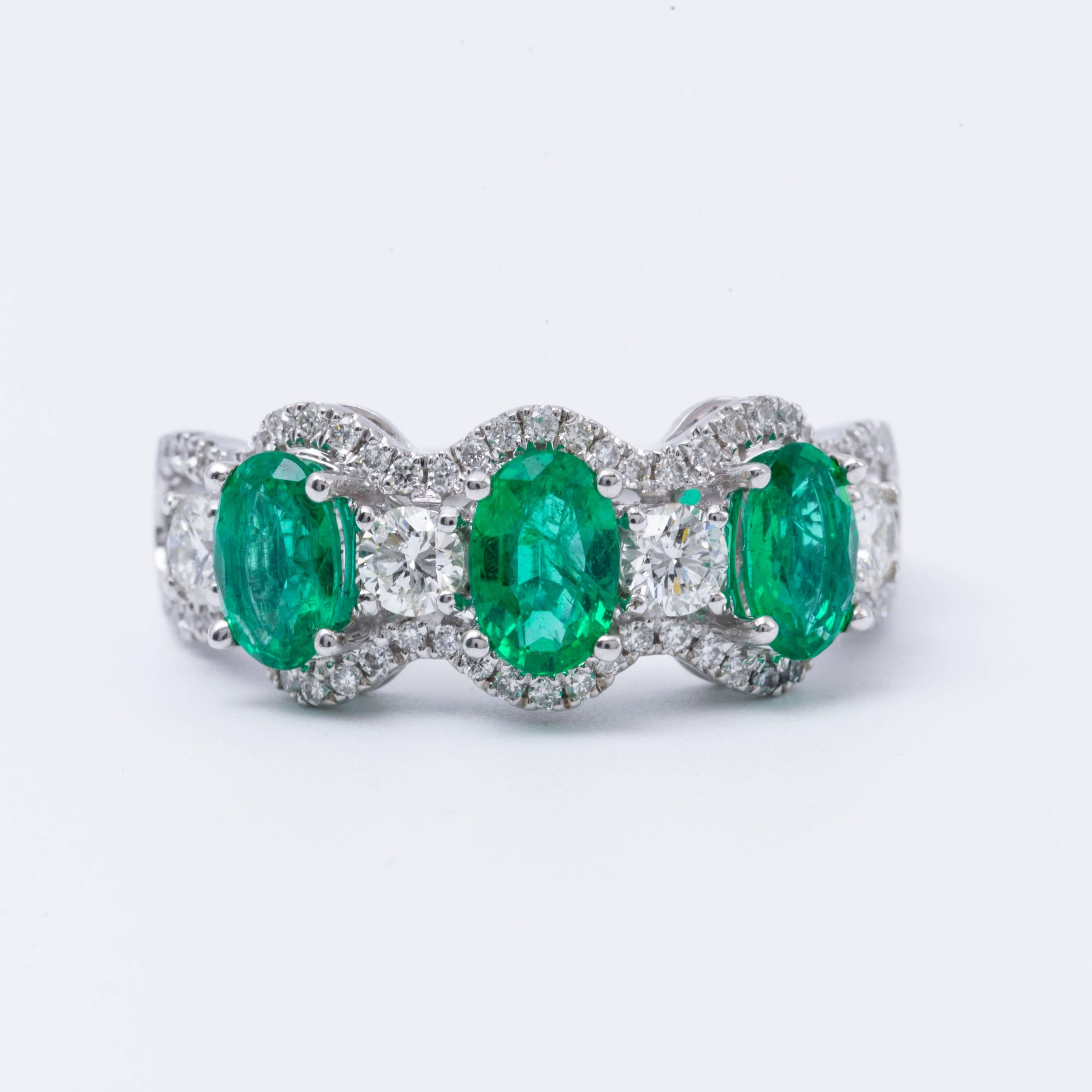 Oval Emerald and Diamond Accented Three Stone Gold Band Ring In New Condition In New York, NY