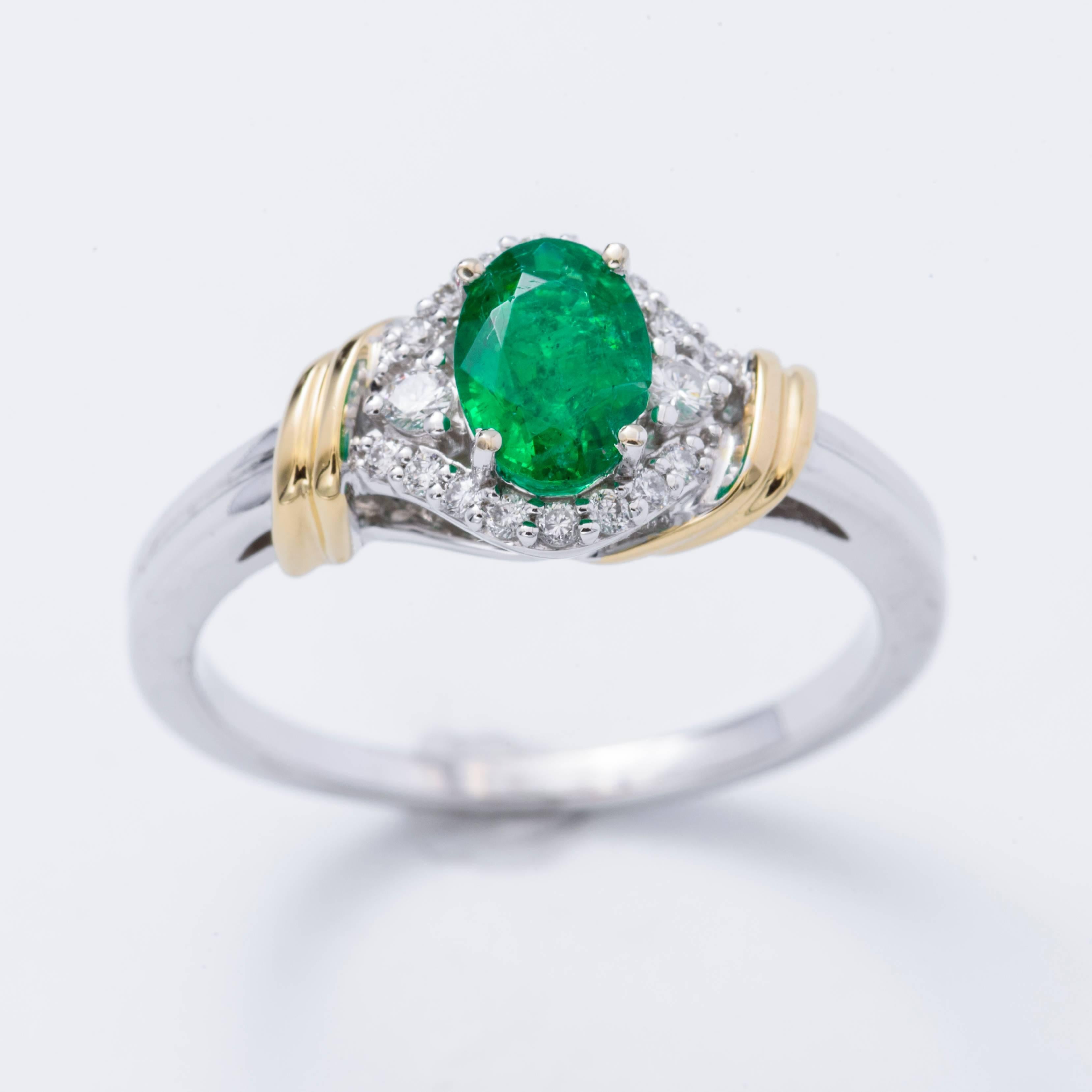 14K White and Yellow Gold Zambia Emerald ring, the emerald measures 7x5 mm for a total weight of 0.65 cts., the diamonds weights 0.15 cts.
Size of ring 6.50( can be sized)
All our Gemstones are genuine, and are sourced with the highest degree of