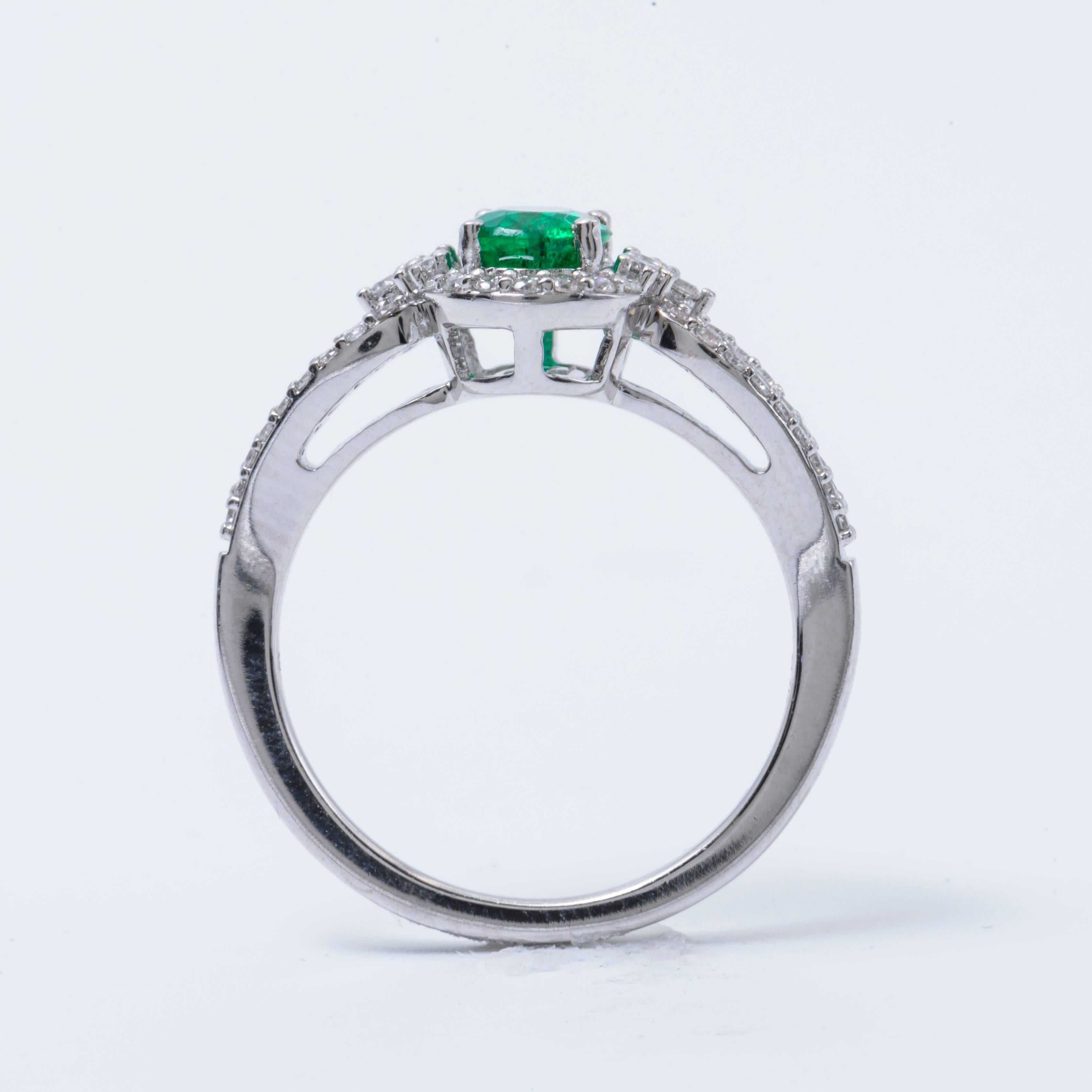 Oval Shape Emerald and Diamond Halo Engagment Cocktail Ring In New Condition In New York, NY