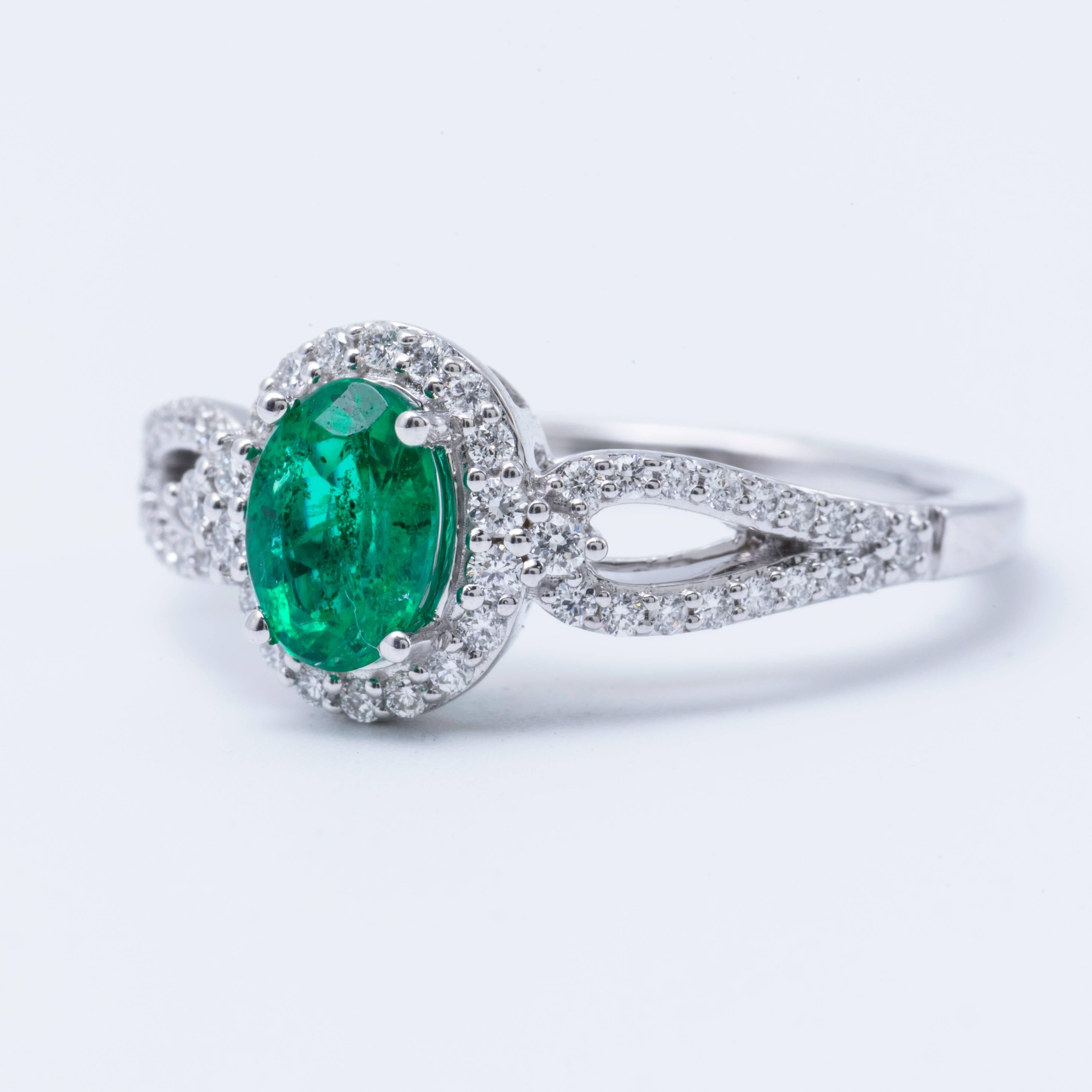 Women's Oval Shape Emerald and Diamond Halo Engagment Cocktail Ring